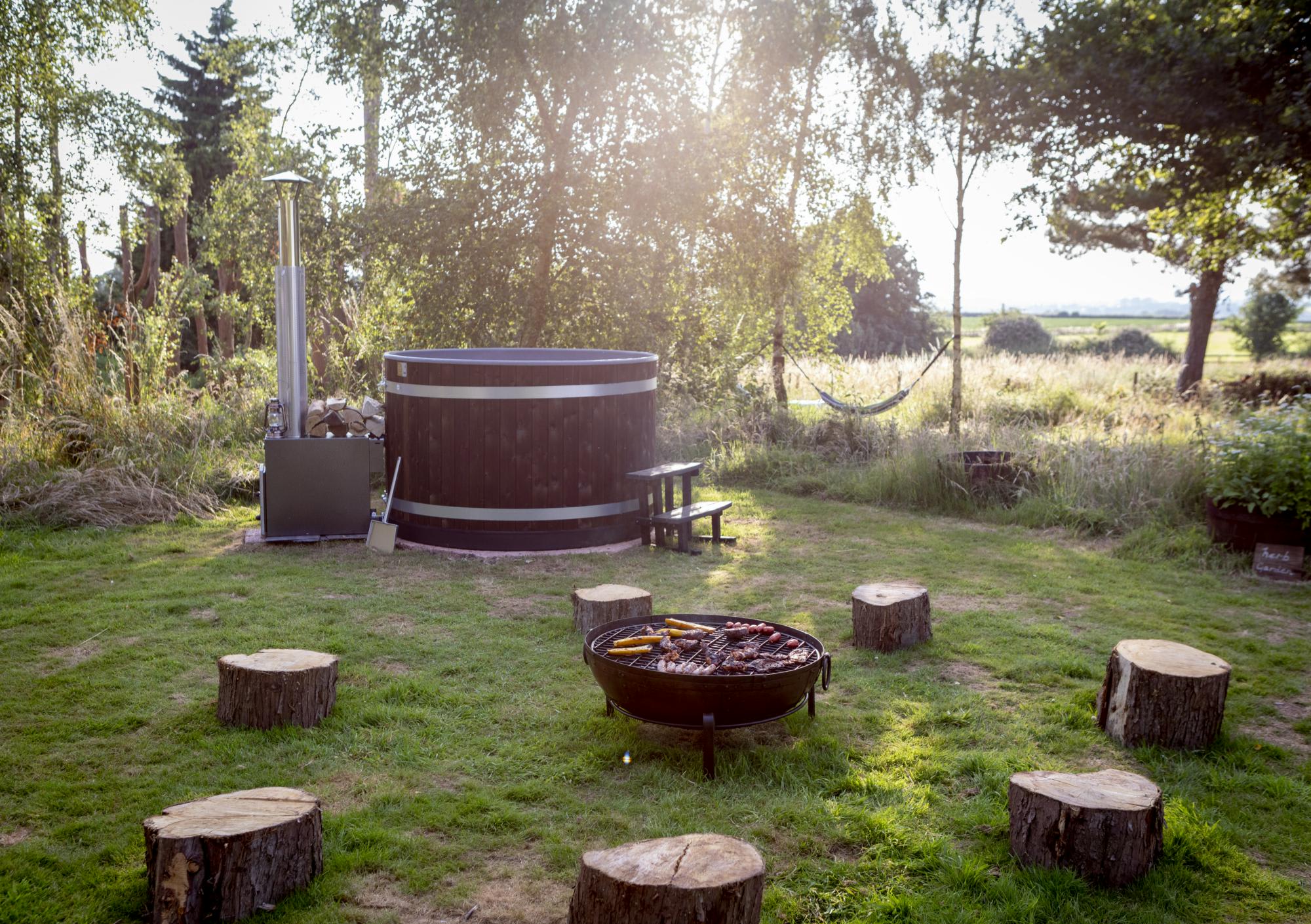 Each tent has is own Kirami 6 person wood-fired hot tub plus very large Indian Firebowl/BBQ. 
