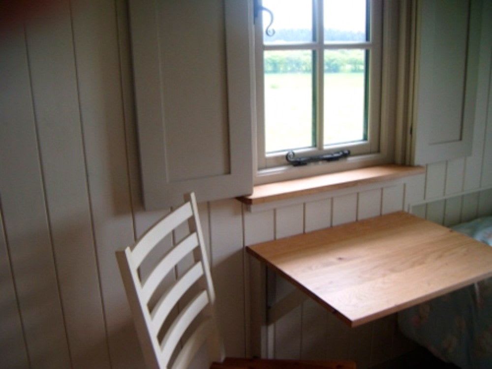 A single traditional shepherd's hut with wonderful views across the Surrey Hills.