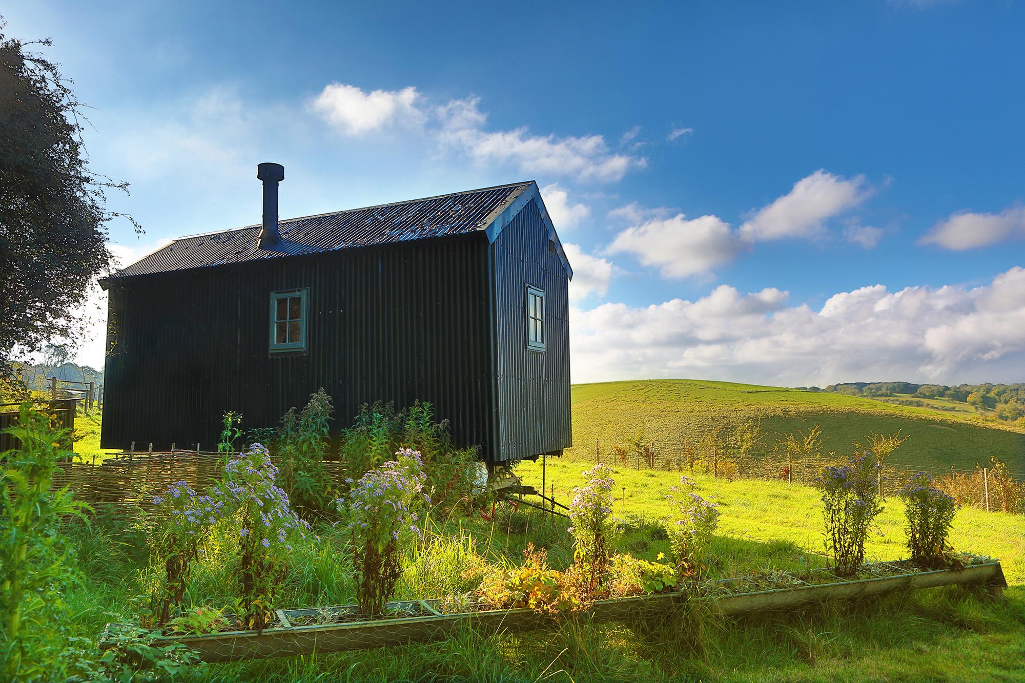 An authentic shepherd's hut in Kent, restored from the 1890s and kitted out for couples with a king-sized bed, wood-burning stove and views over the Kent Downs.