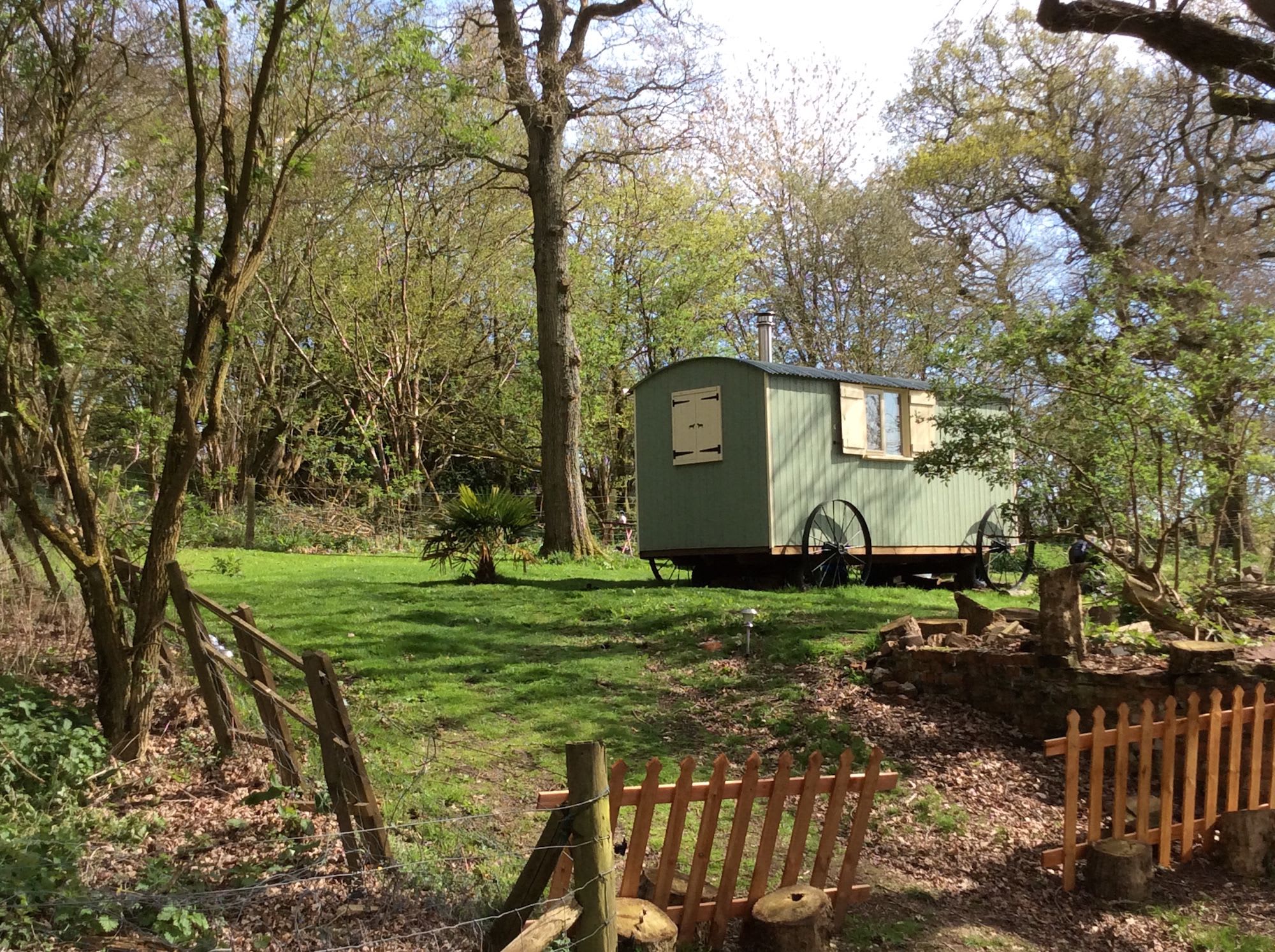 Glamping in West Sussex: A family-run site with cosy shepherd's huts, all with a superb location on the South Downs Way.