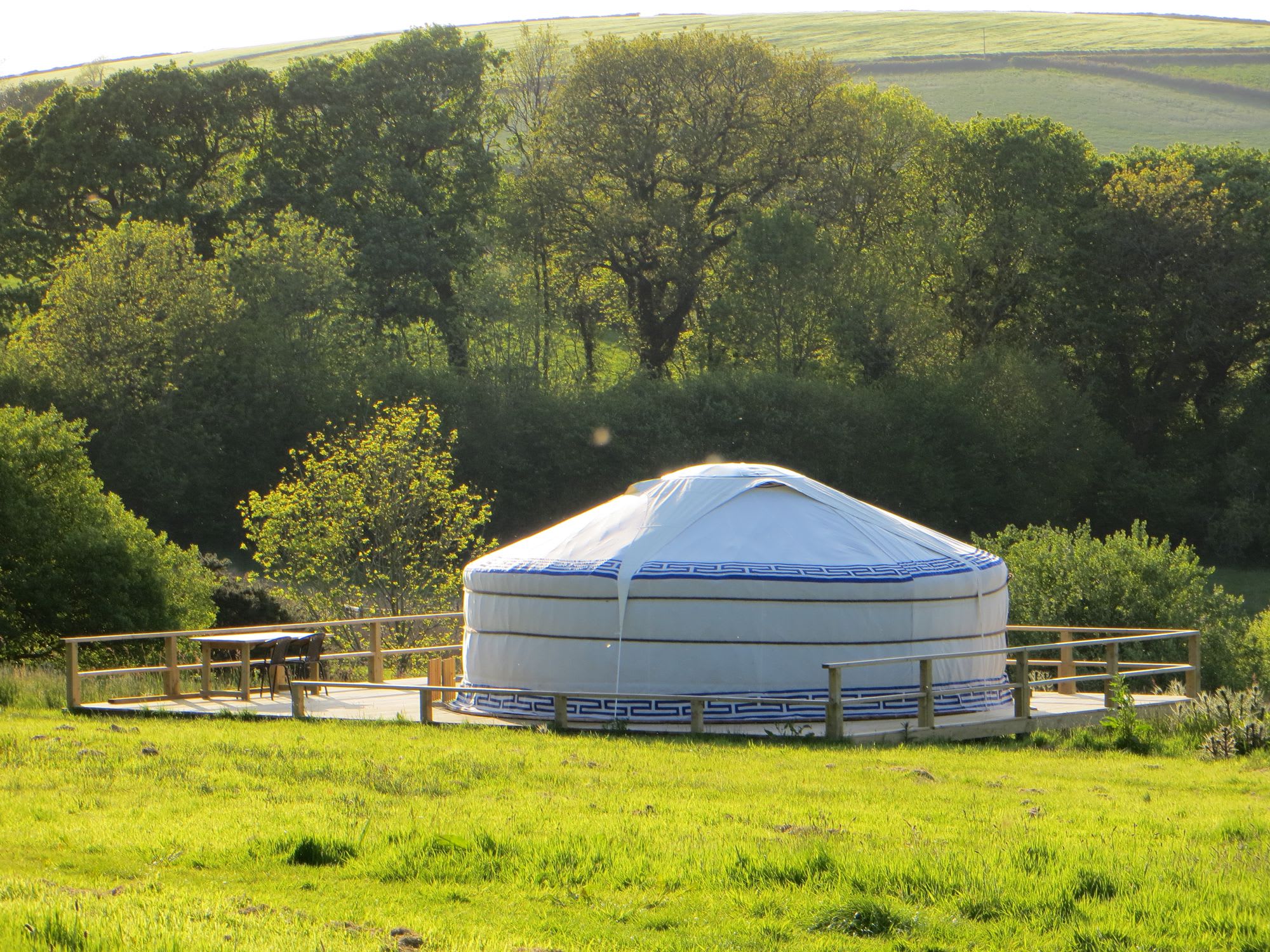 A pair of fully furnished, family-sized, glamping yurts on a working farm in Looe, Cornwall.