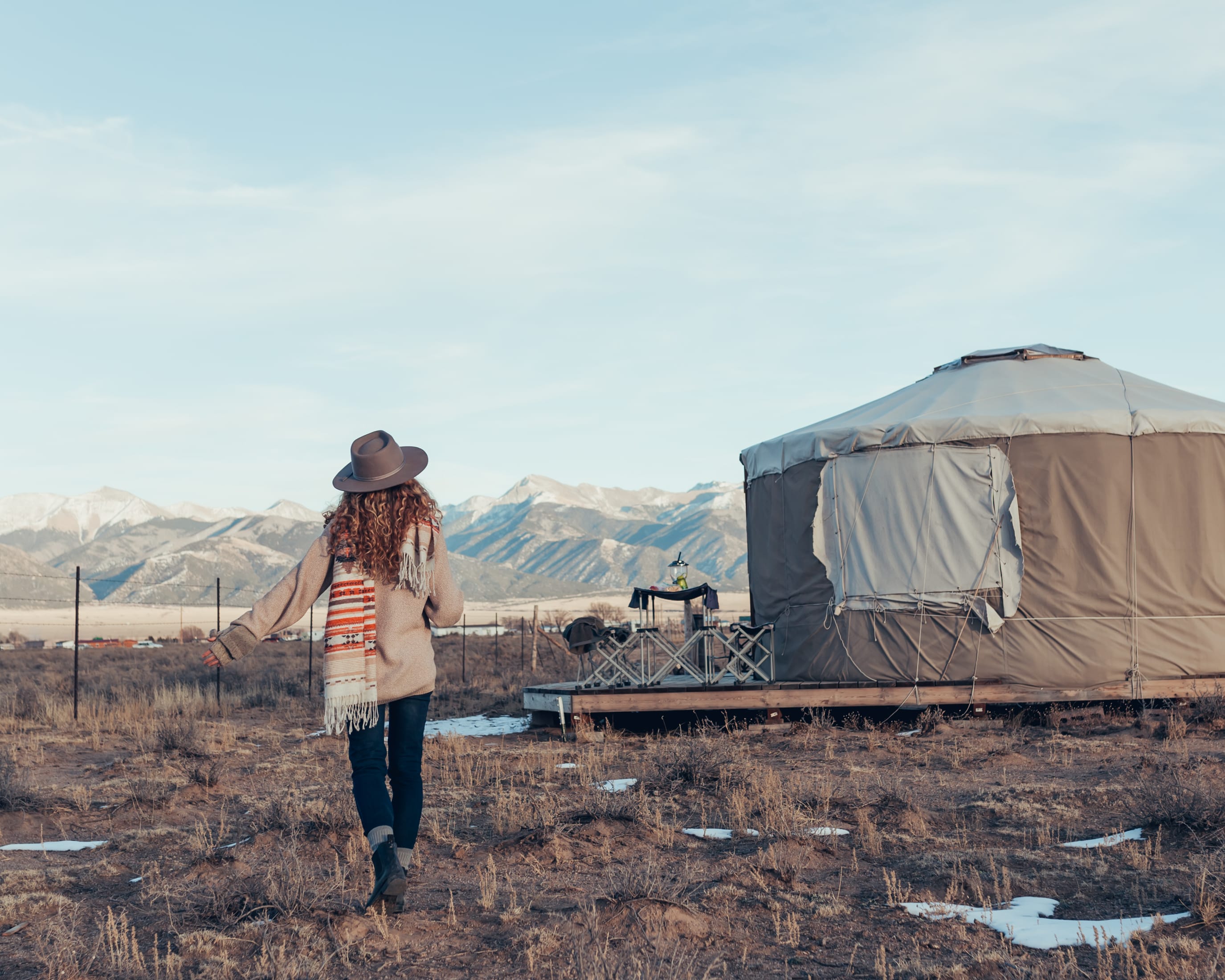 Happiness is a yurt with mountain views and camels for company. 