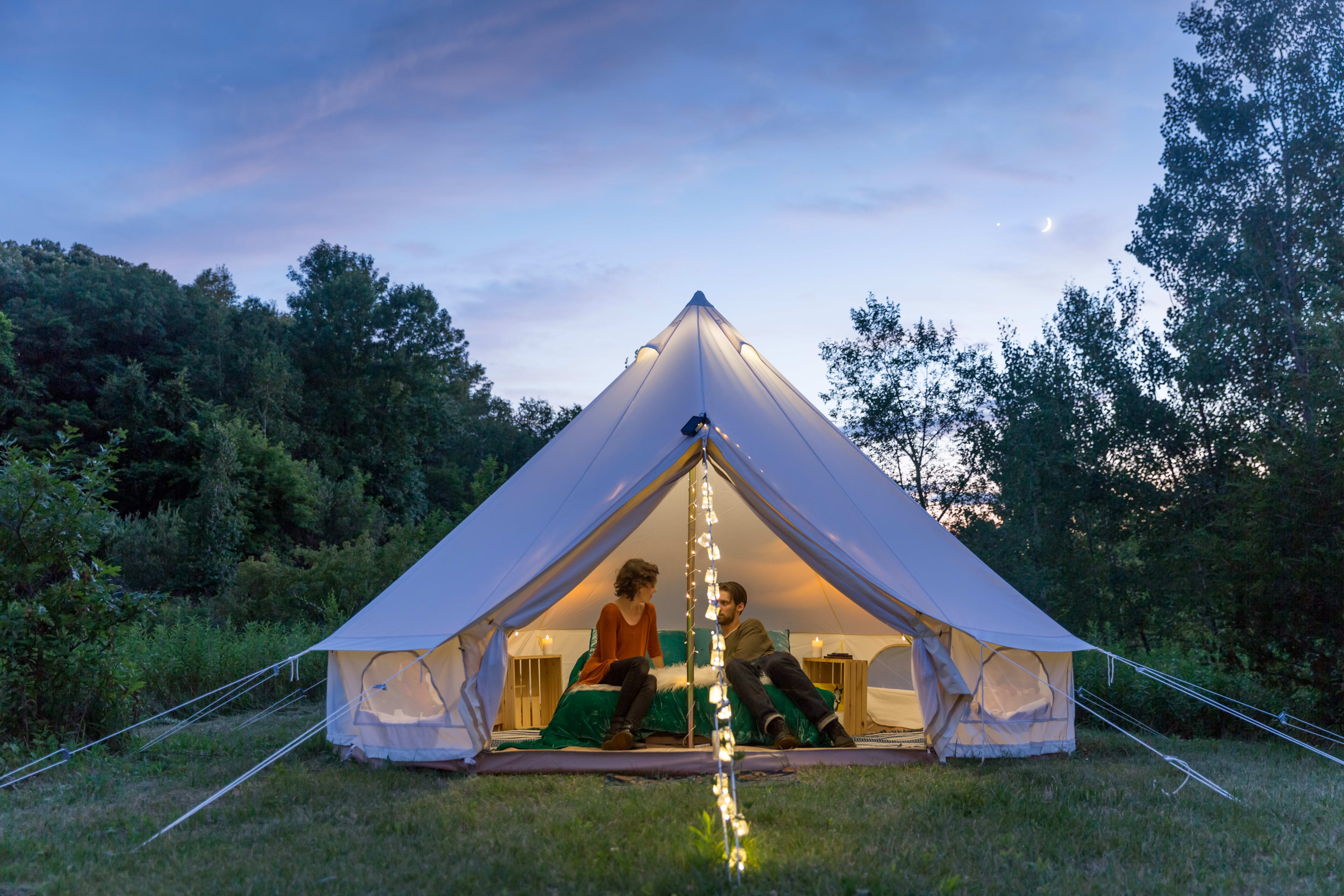 There is nothing more magical than a tent at twilight.  The bell tent is set up with pretty string lights on the posts and down the front, as well as a lantern hanging from inside the top, so even after dark the tent was an inviting place to hang out.