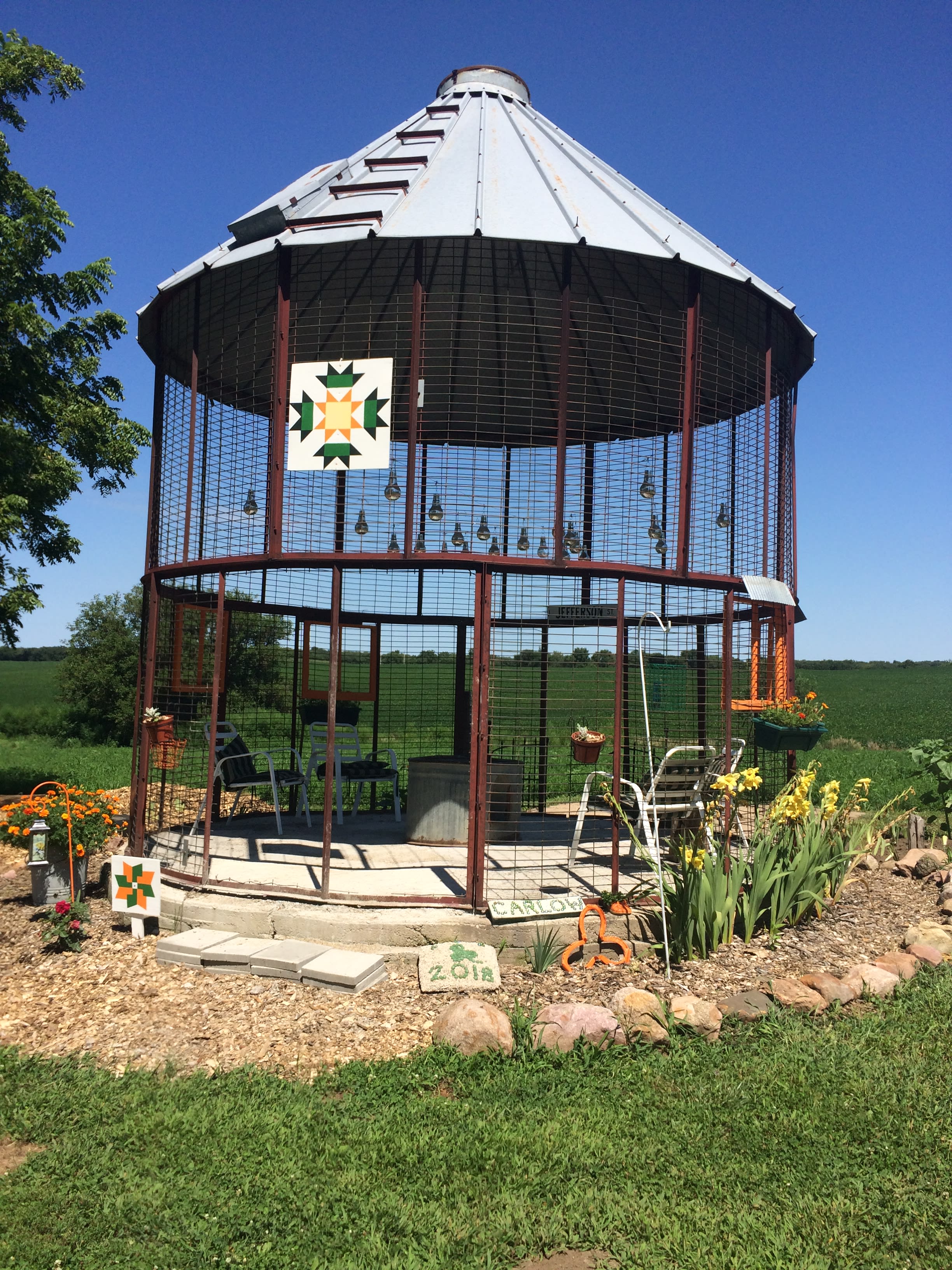 Here is our rustic grain bin area, great for hanging out under the stars.