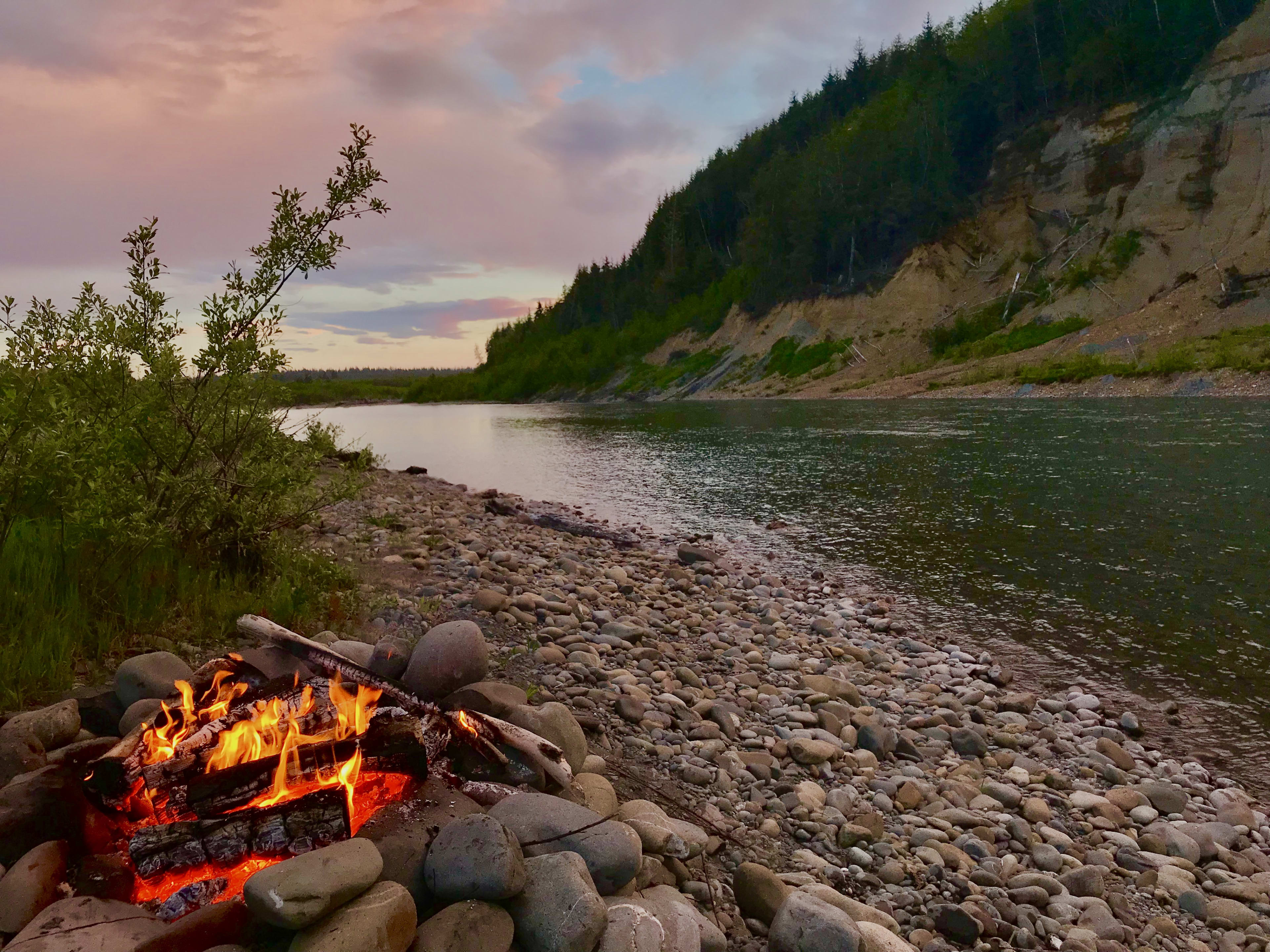 Relax by the river all night. Grab your cooler, camping chair, snacks and chill out by the river with a campfire and natural beauty. The river is a short walk away from camp. Fire pit located in designated area. 