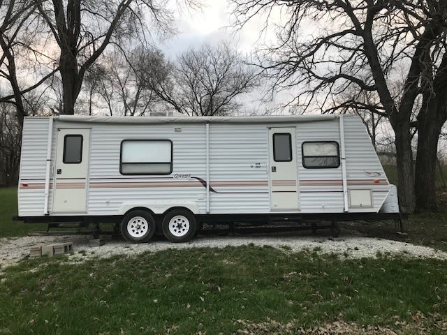 RV Travel trailer for nightly rent.  Full hookup with one Queen bed and couch folds into a gaucho bed.  Sleeps 4 comfortably.  
