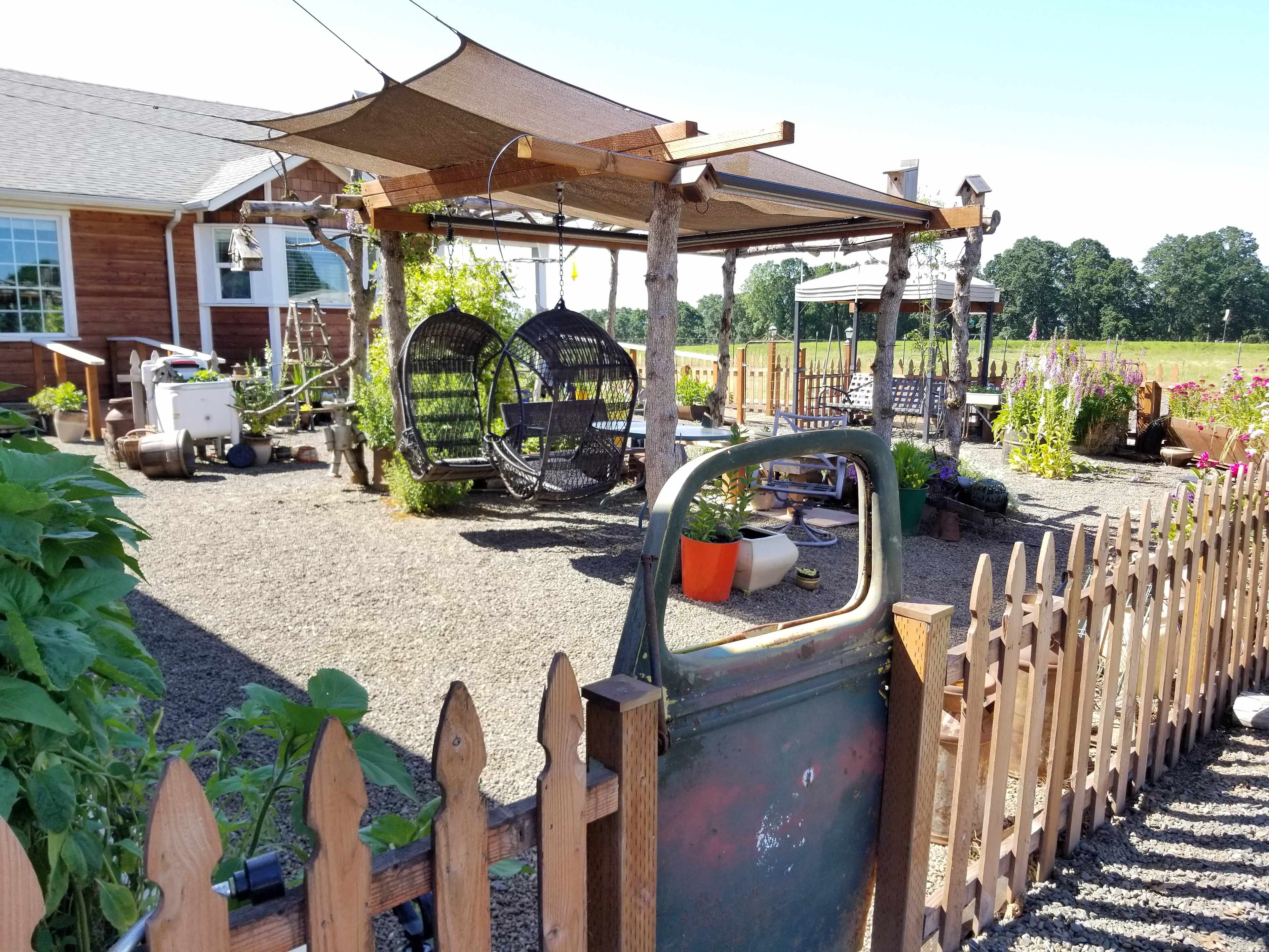 Basket swings in flower garden