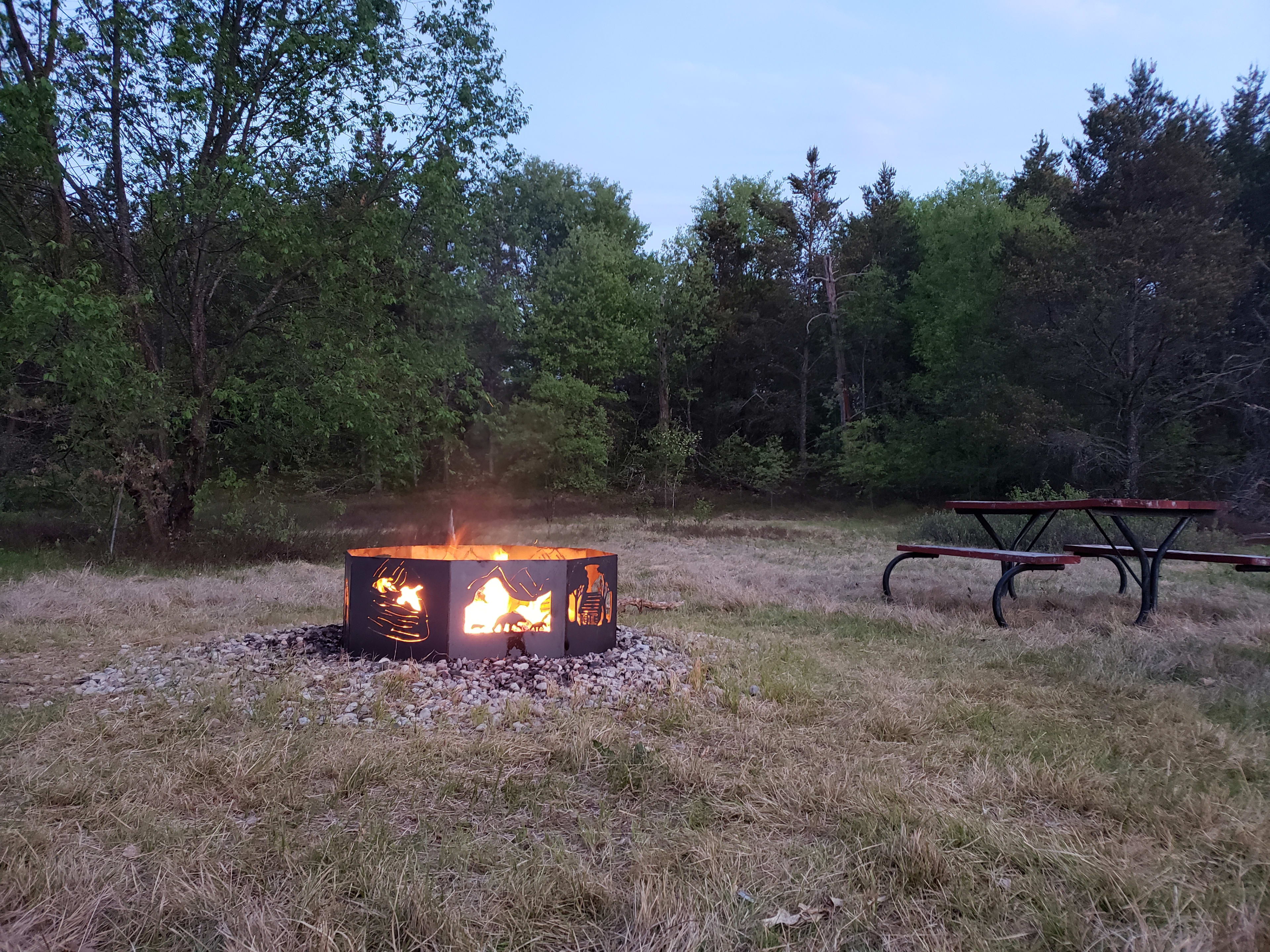 Steel Fire Ring and site picnic table