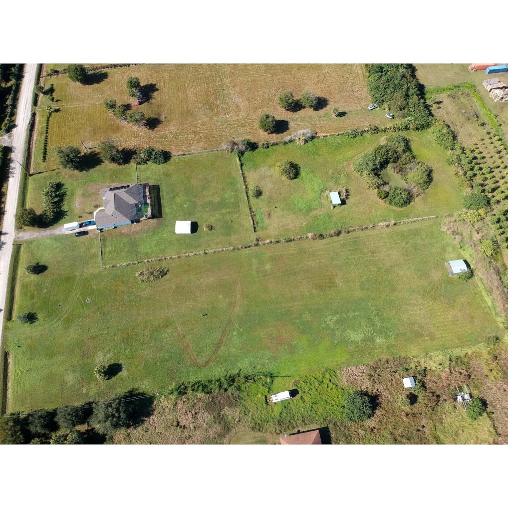 Aerial shot of 5 acre property. Hip campers will be camping on the 2.5 acres to the right.