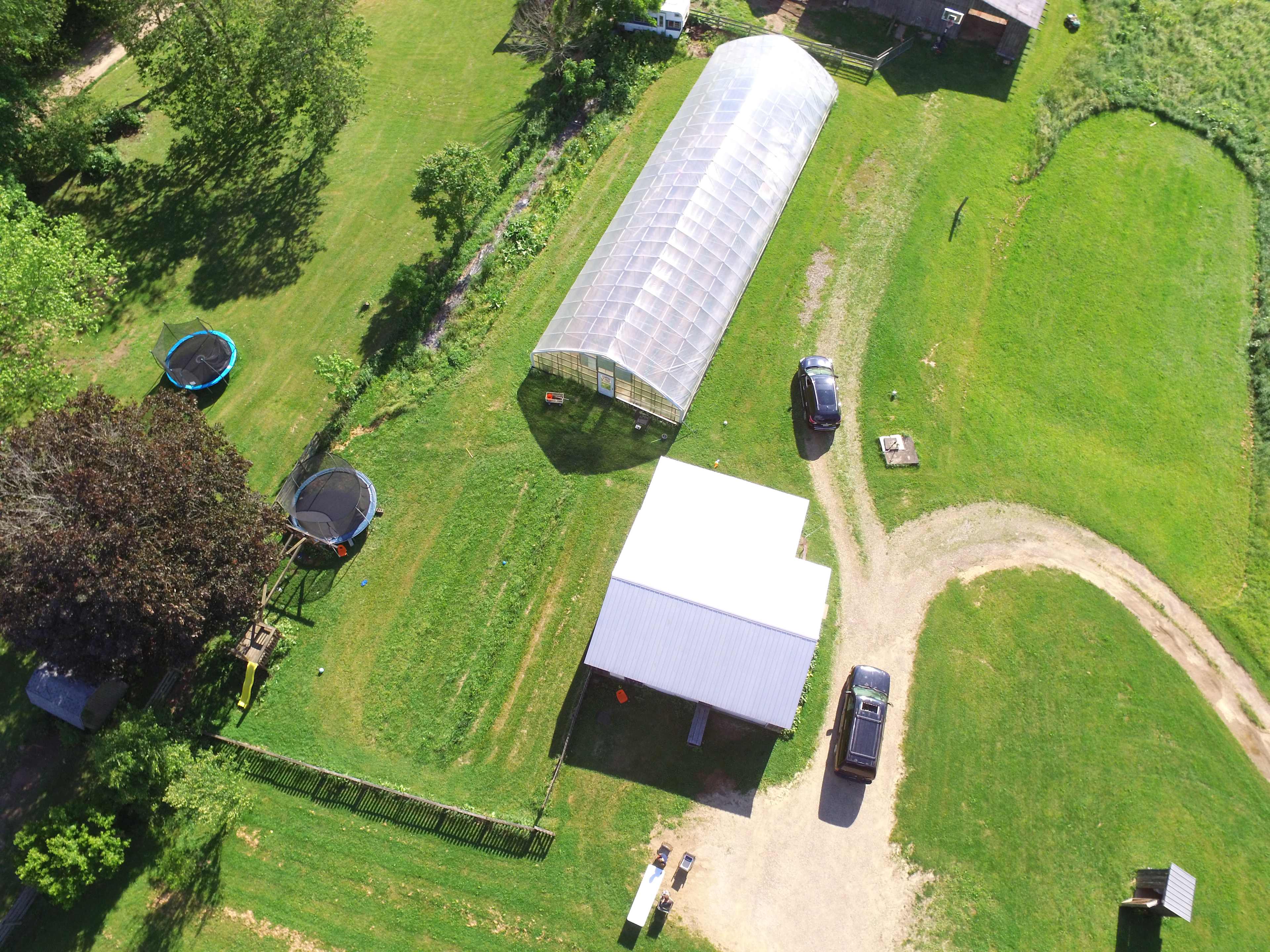 The long spot beside the hoop house is where campers can park vehicles, including campers and RVs