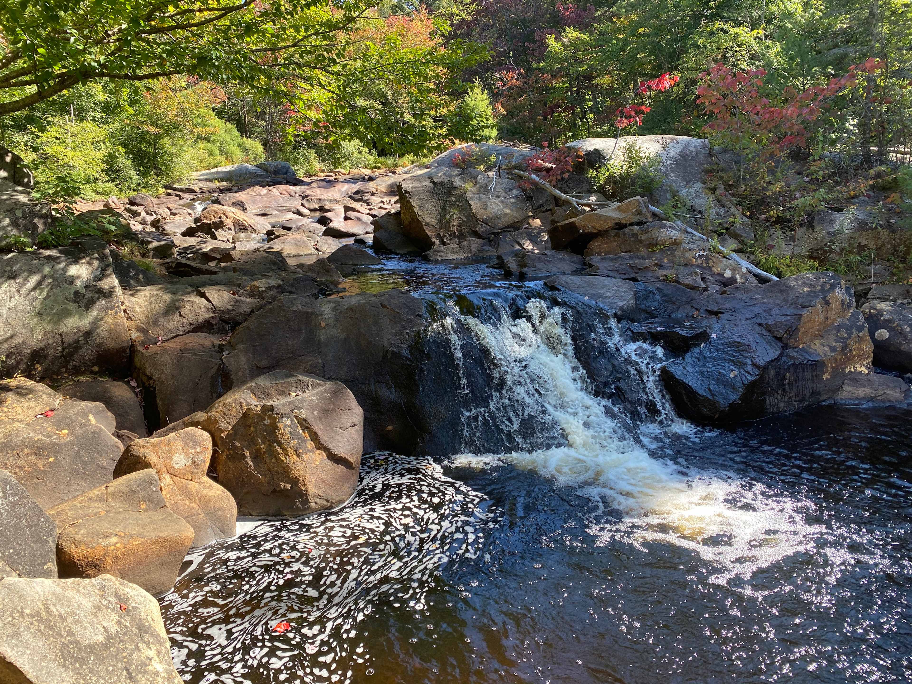 Small waterfall behind the cabins.