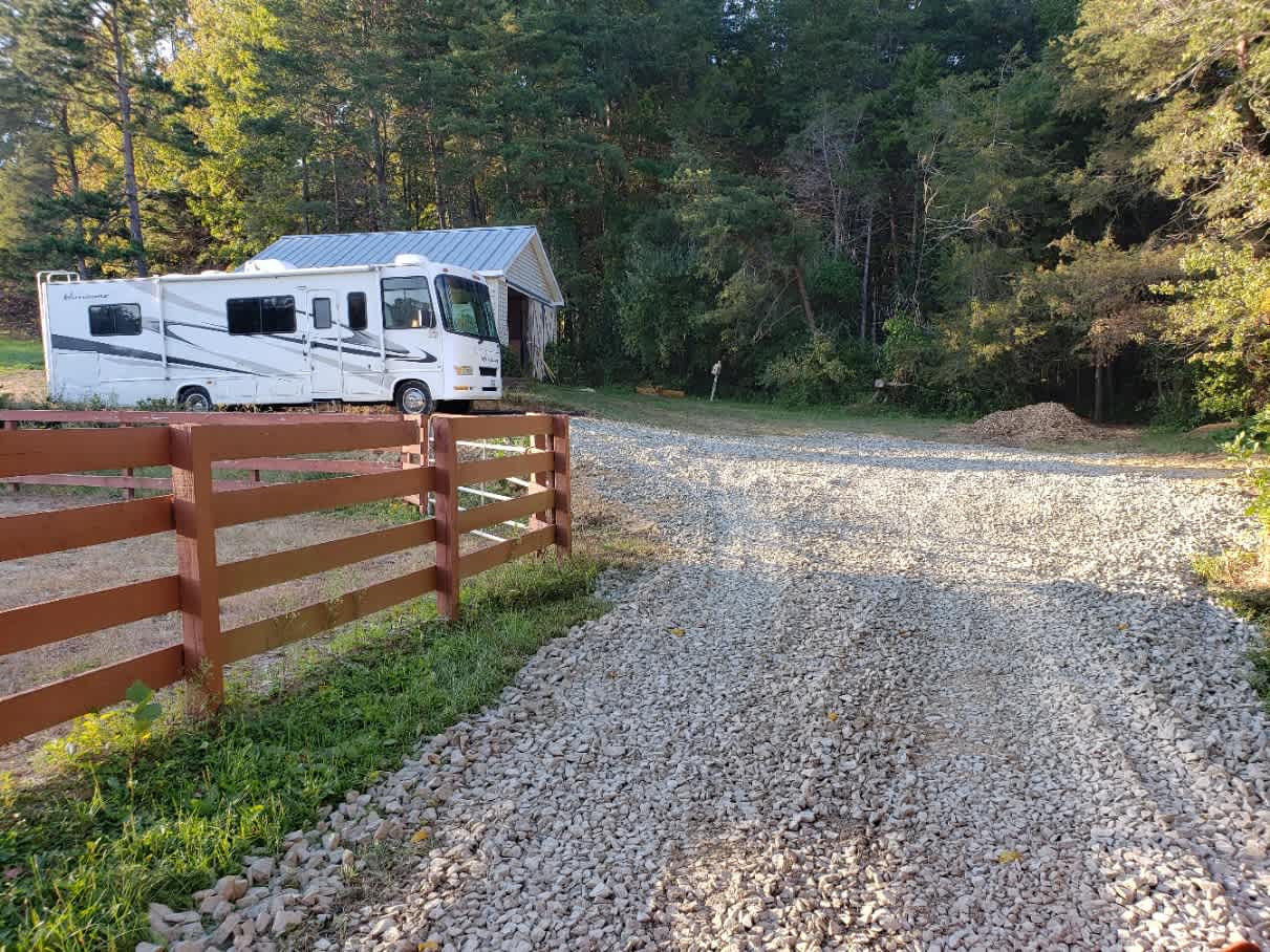 Tjhe site is down a 100 ft X 14 ft wide narrow drive. 