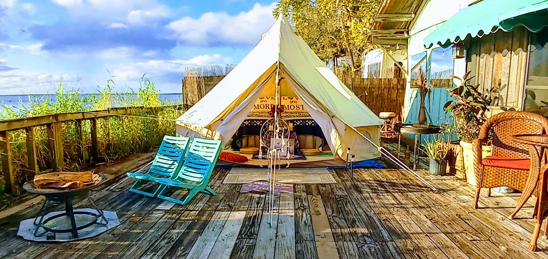 Waterfront private campsite with bistro table, Fire pit, and plenty of space for your gear!