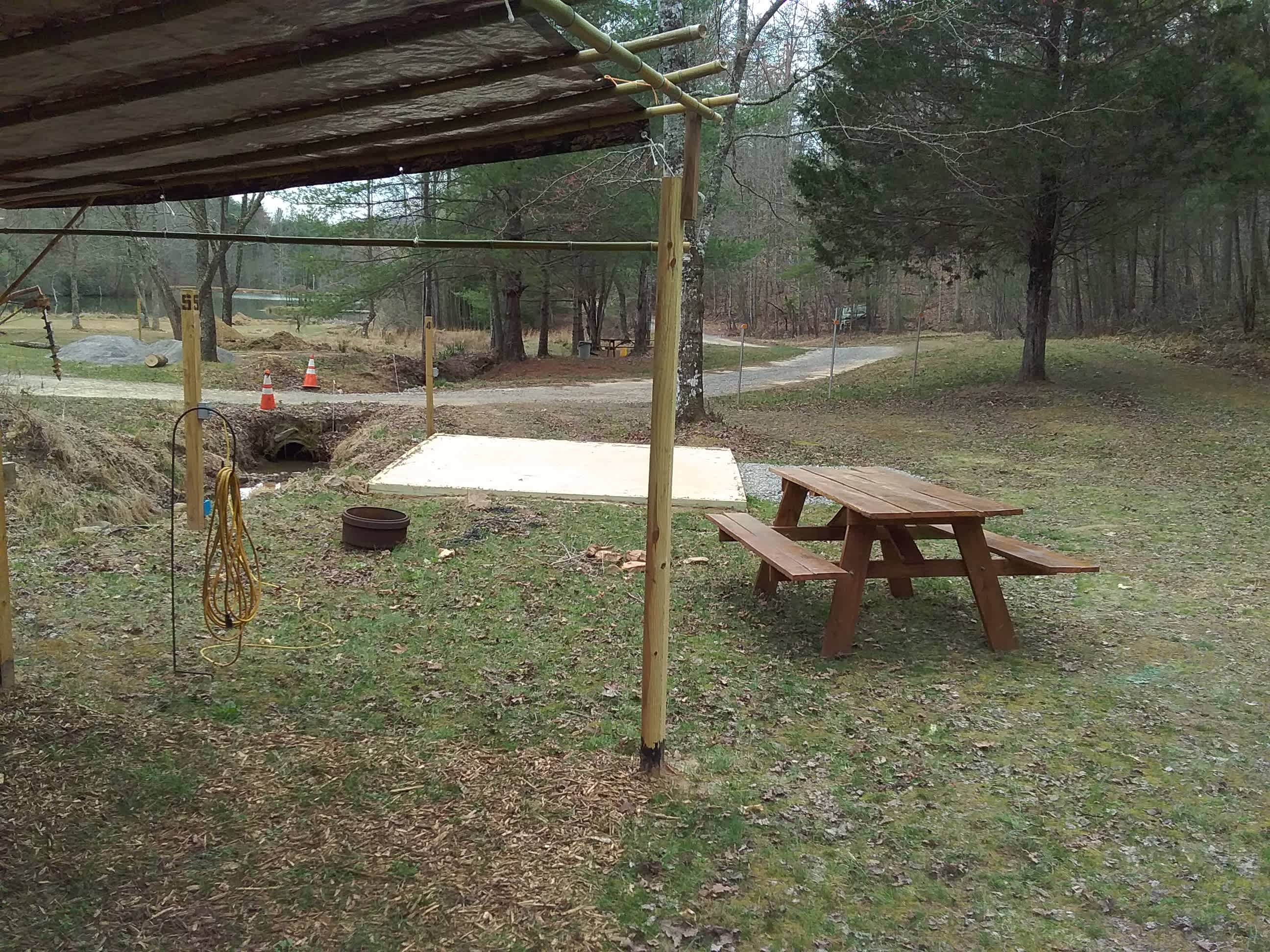 12x12 tent pad with 9x12 tarped lean-to. 