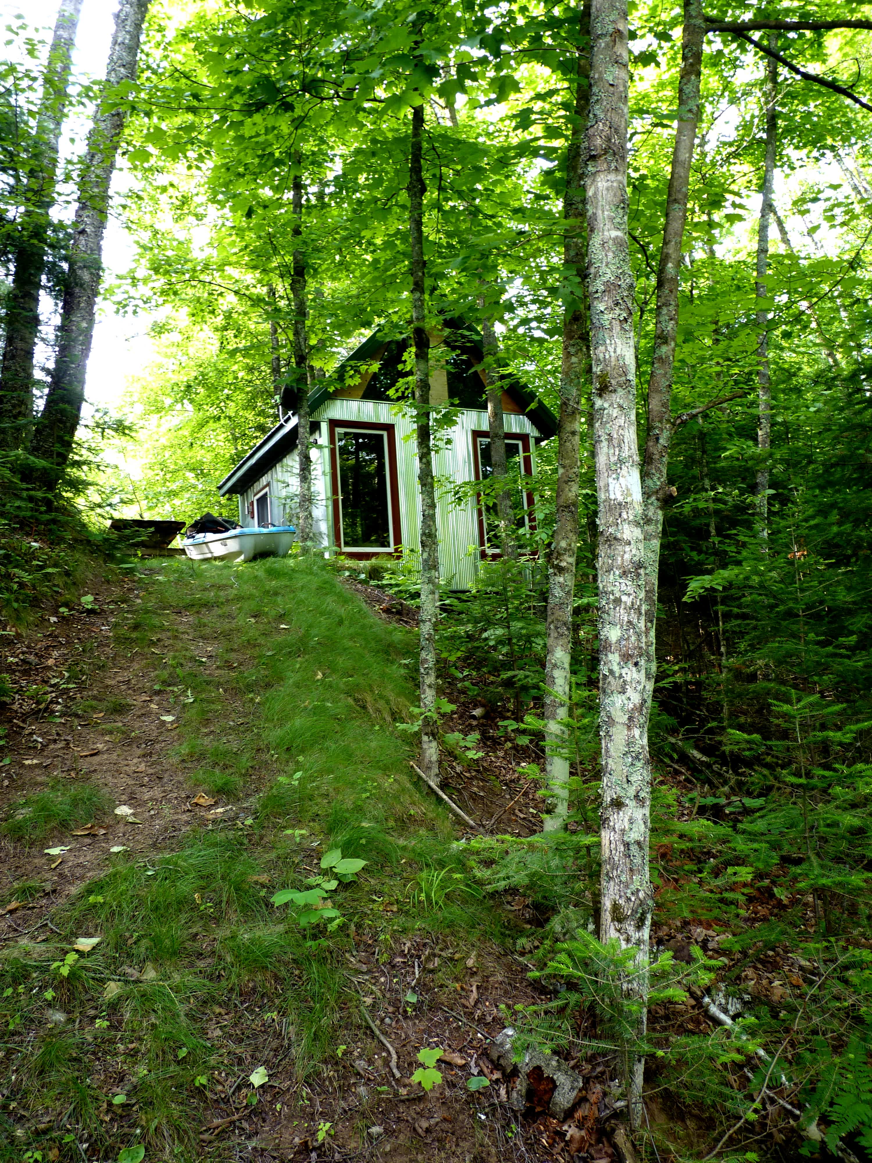 View of the cabin from the trail to dock.