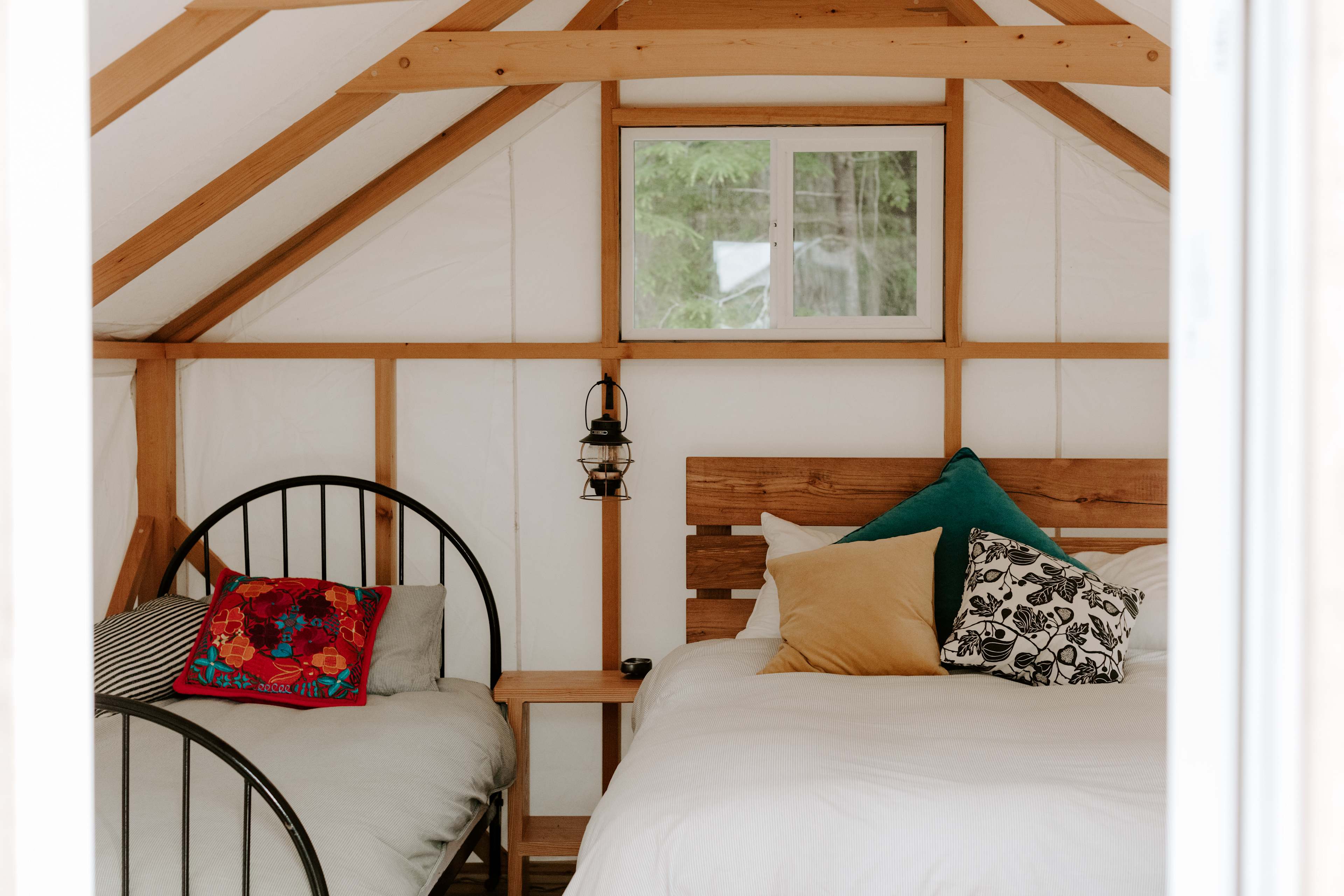 Cabin 4 has a queen bed with heated mattress, down comforter and yummy pillows and linens. The twin bed has it all, minus the heated bed.