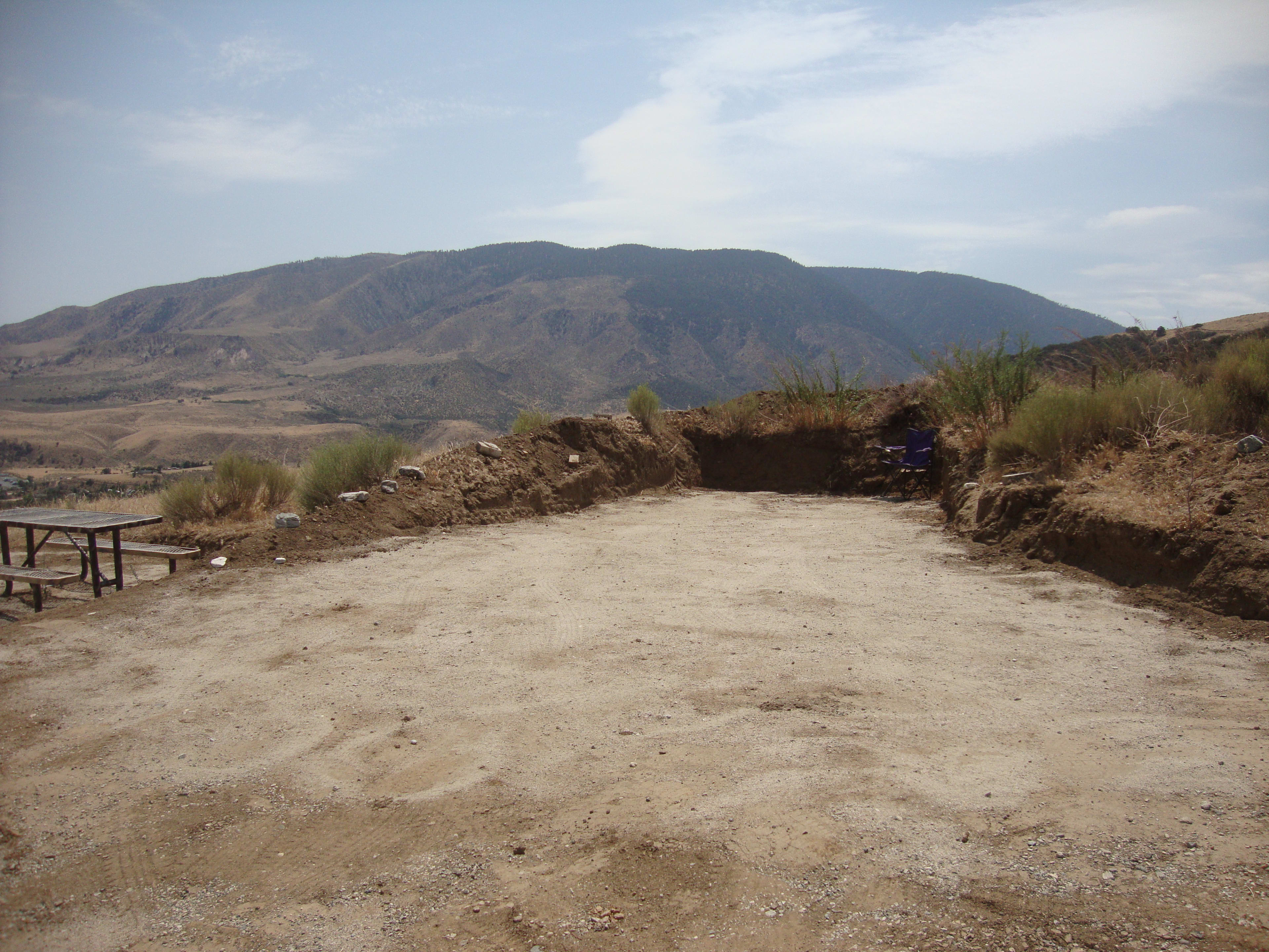 Summer 2021, the wind protection berm fully built up and the ground coated with a layer of soft sand.  The view of Frazier Mountain and the San Andreas Fault is amazing, and in the opposite direction you can see to Tehachapi and beyond!