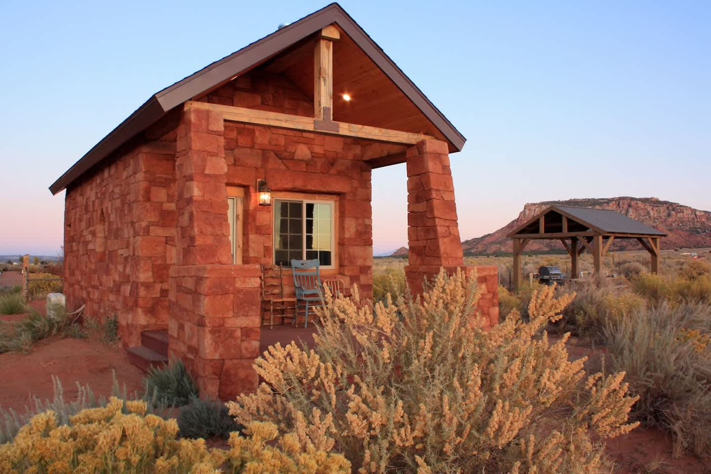 The Little Rock Cabin at the Cane Beds Corral complete with electricity, AC/Heater, full bathroom and kitchenette with mini-fridge.