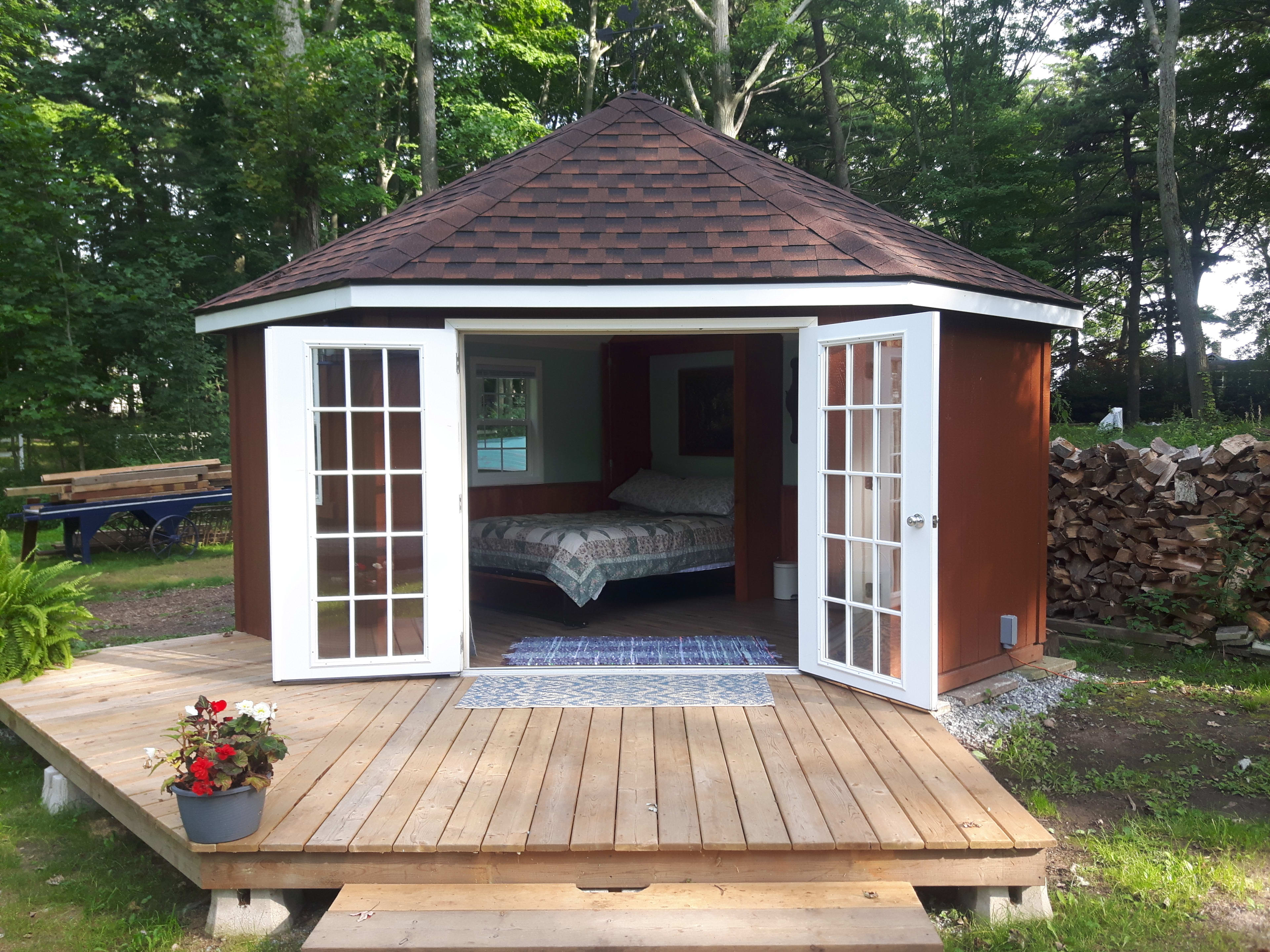 120 square foot cabin with outside sitting deck