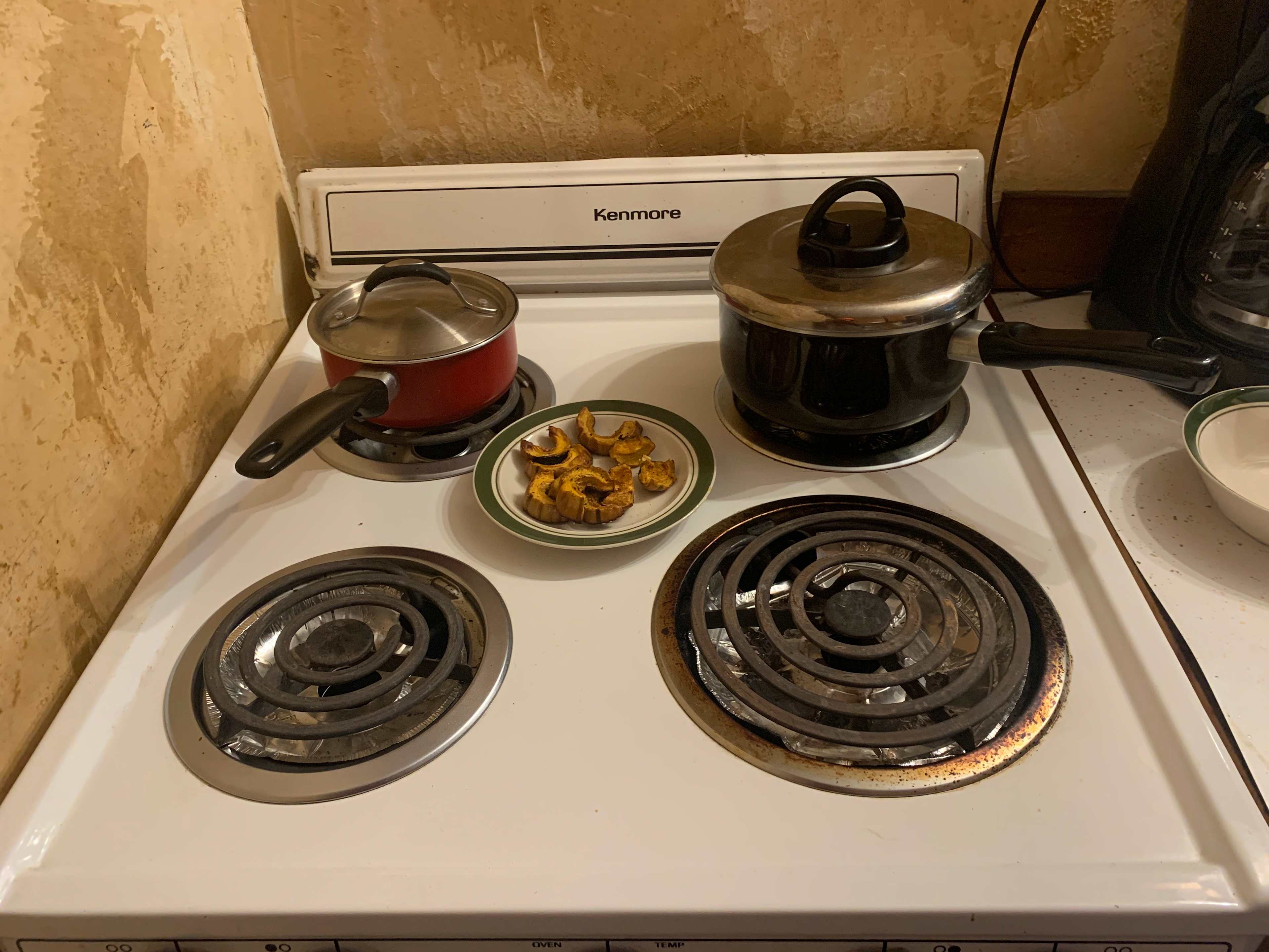 Kitchen has plenty of pots, pans, and utensils. Bring your own squash!