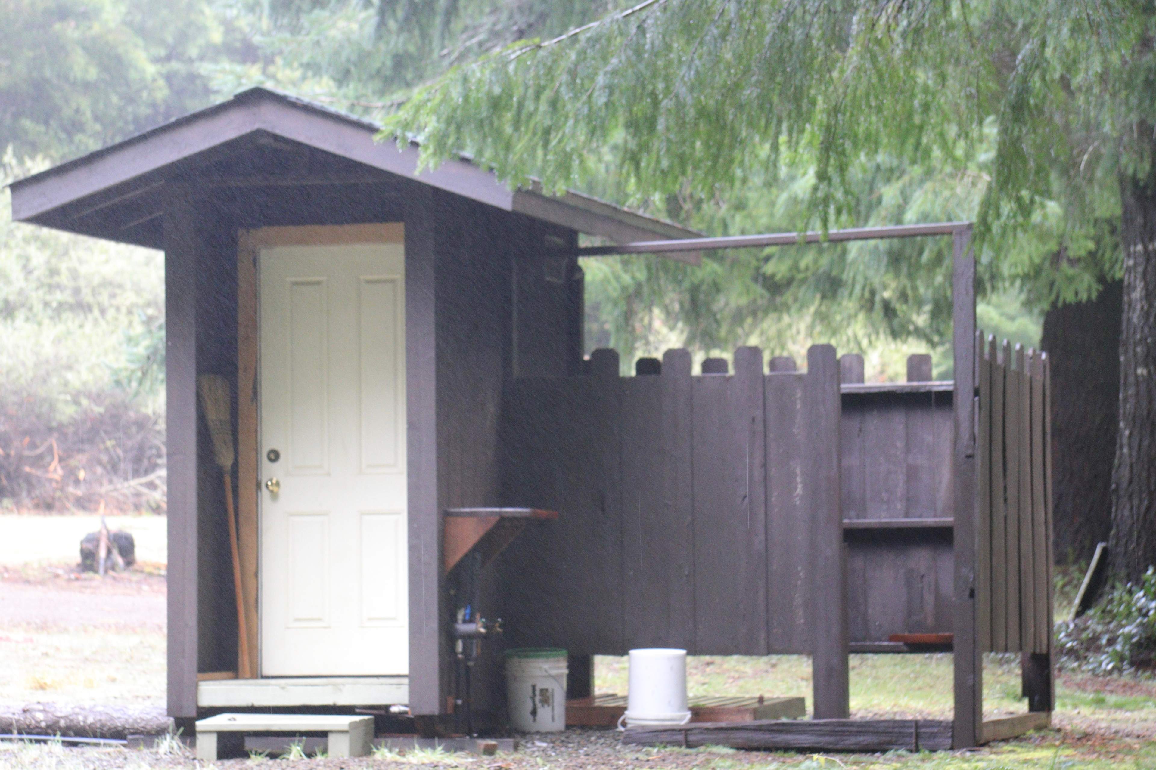 Flush toilet and outdoor solar shower