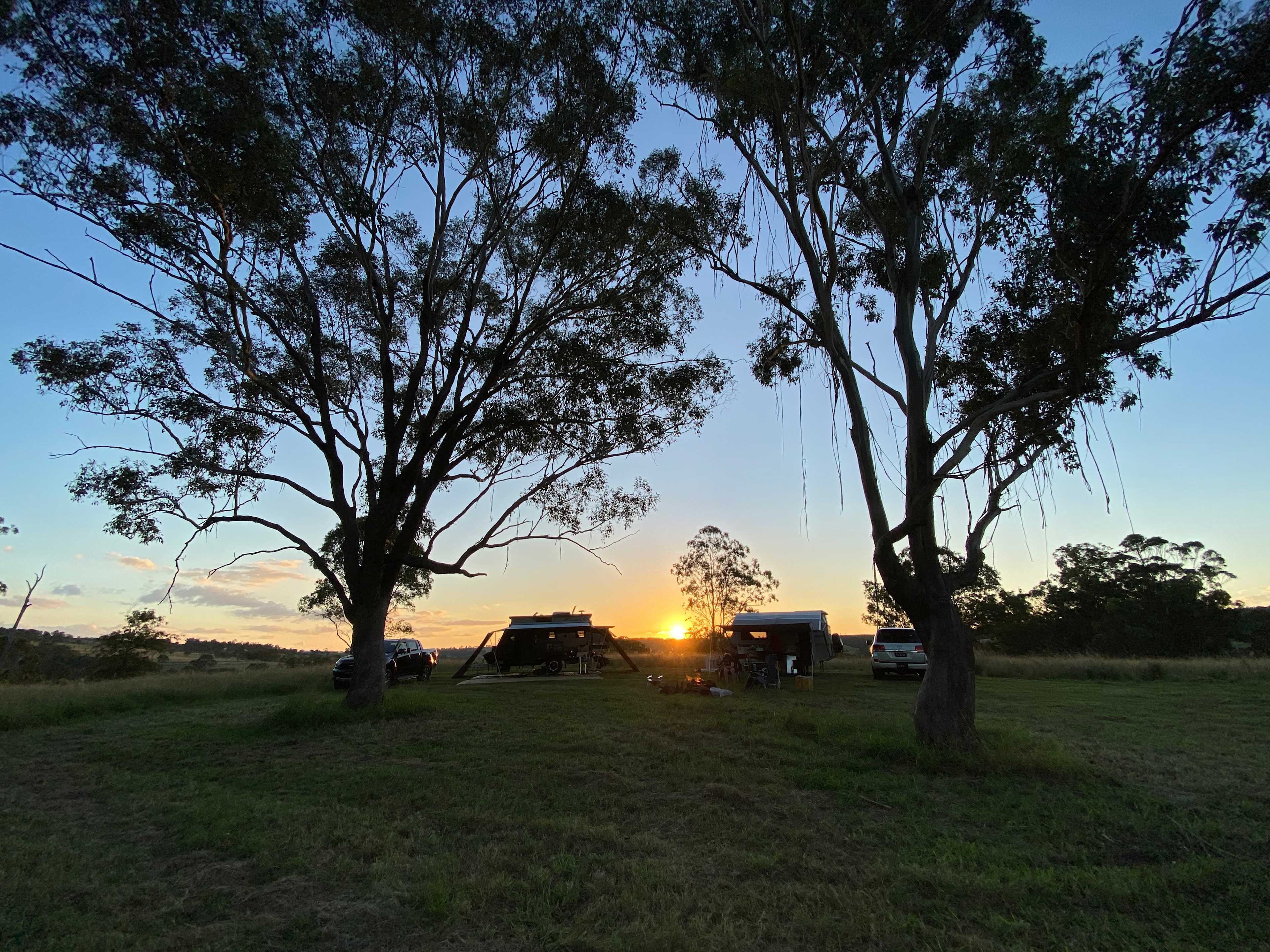 There is about 1500m2 of slashed grass to setup camp with a couple of large trees centrally to provide share on a summers day. Would fit 6 RV's or Caravans with ease spread around the central trees. 