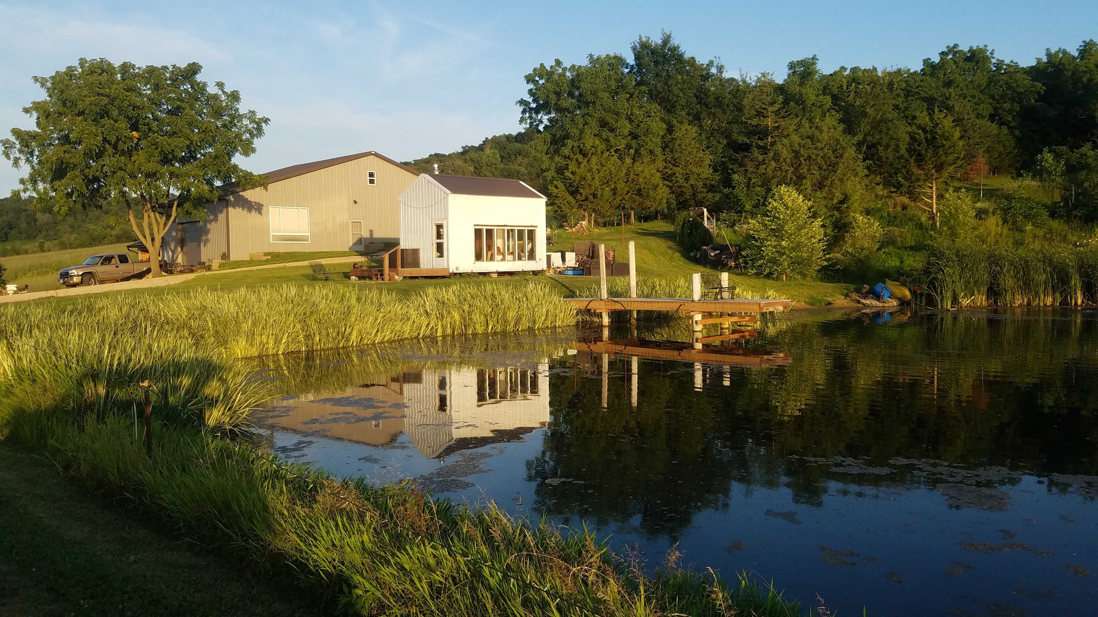 main building behind cozy cabin