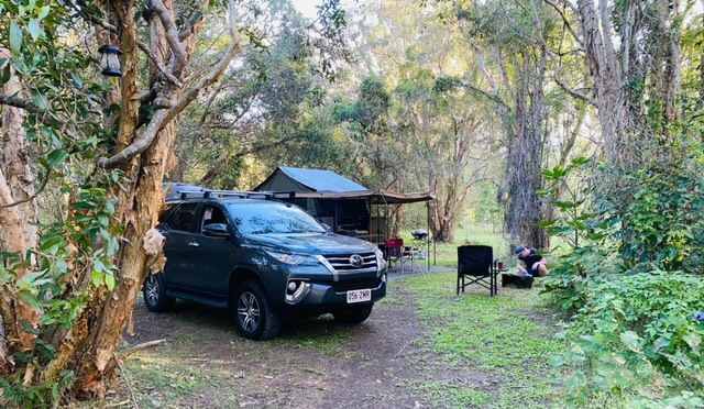 This is the 'Vine Camp' Site. Private small site for tents, campers and swags.