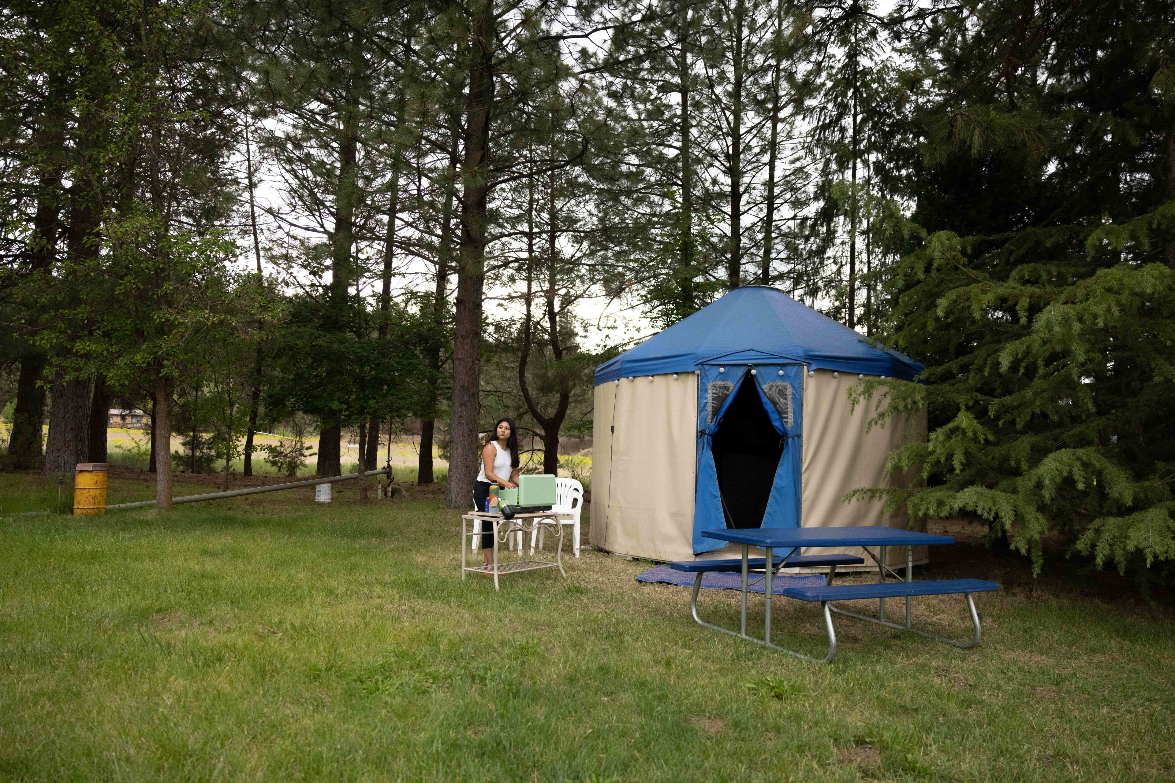 view of the yurt, seating, and cooking area