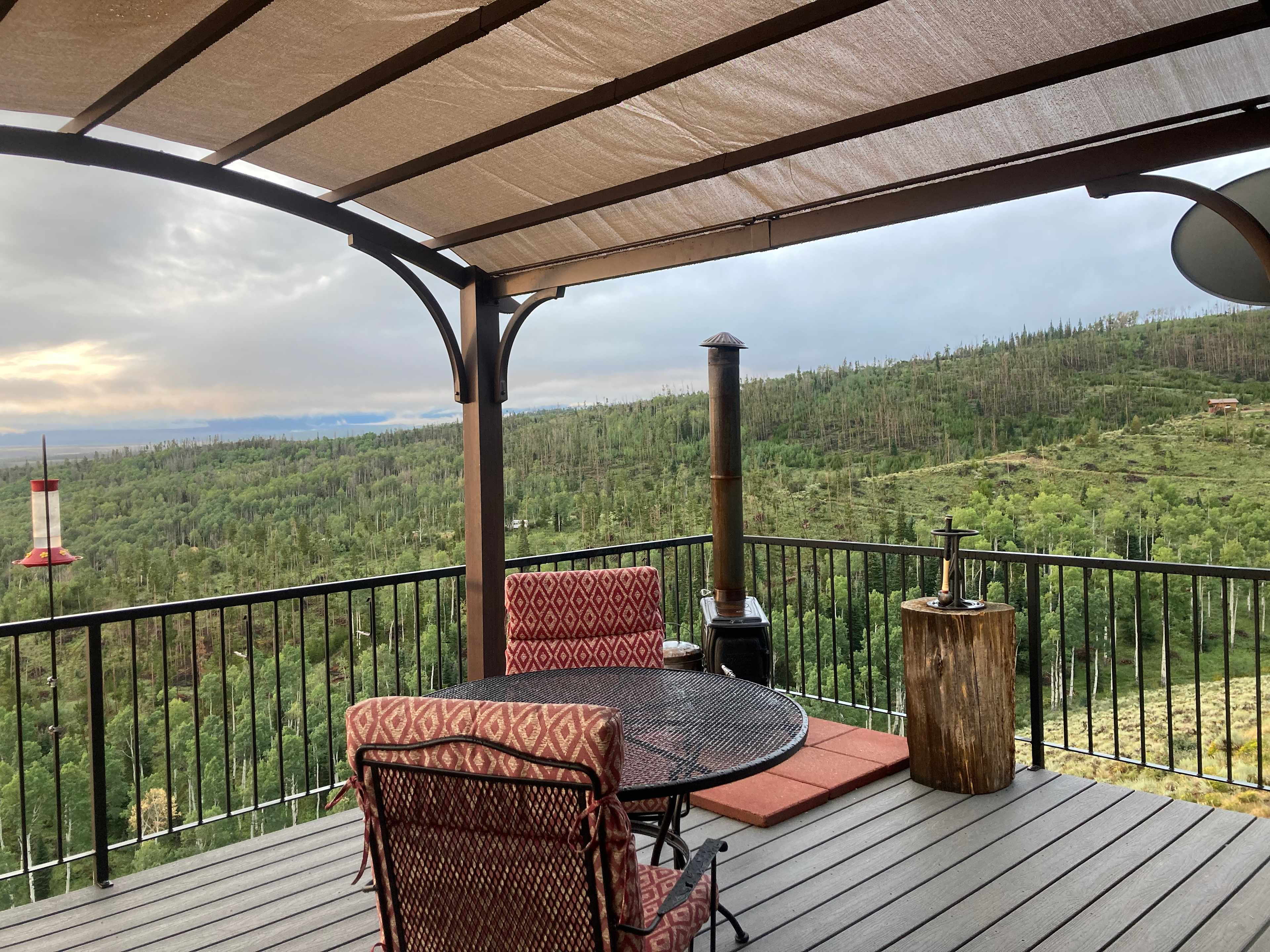 Covered balcony with your table and fire pit/stove