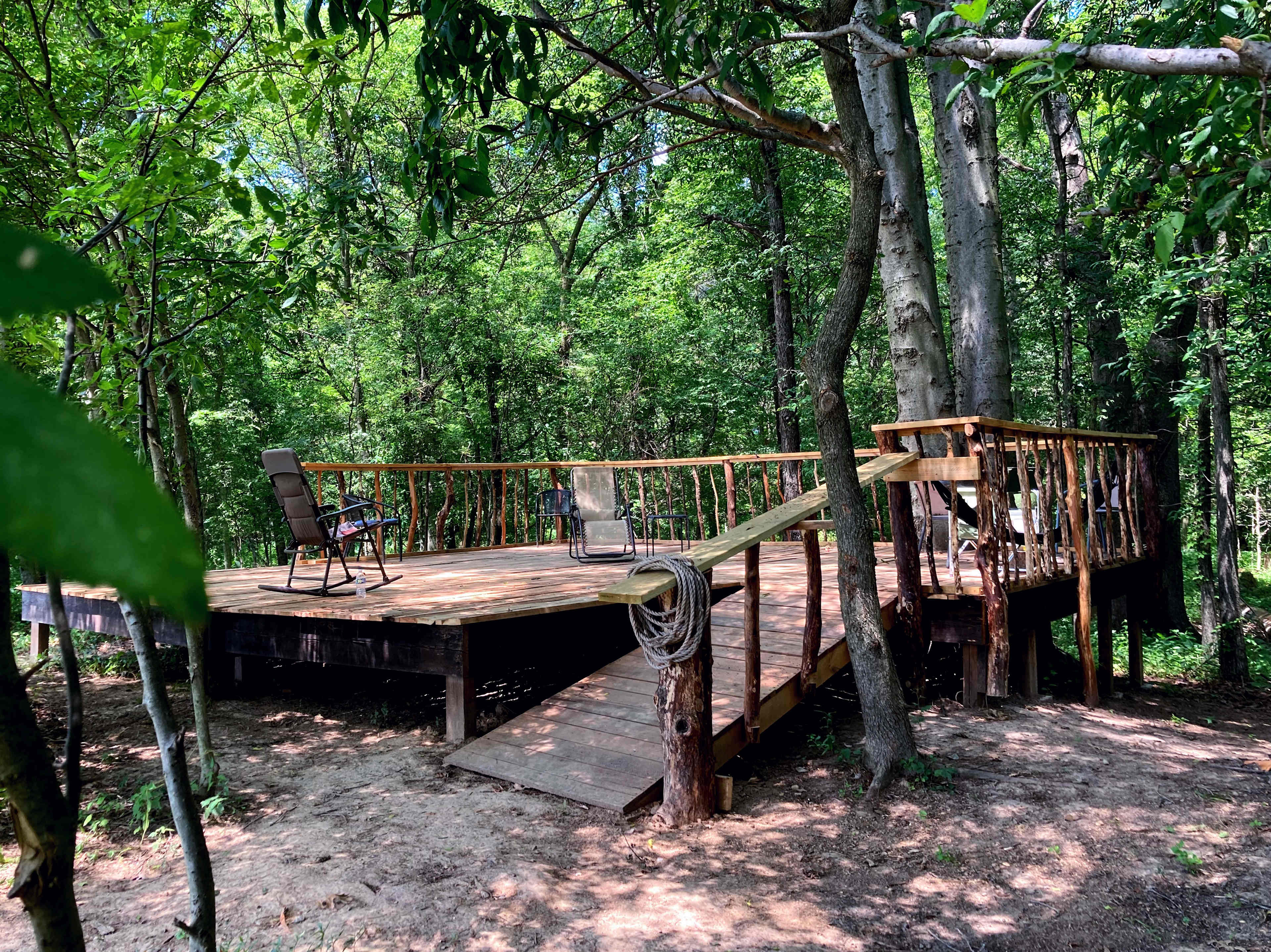 Glamping Tent Platform (seen here without tent) tucked into the edge of the Meditation Woods. Privacy. Serenity. Peace.