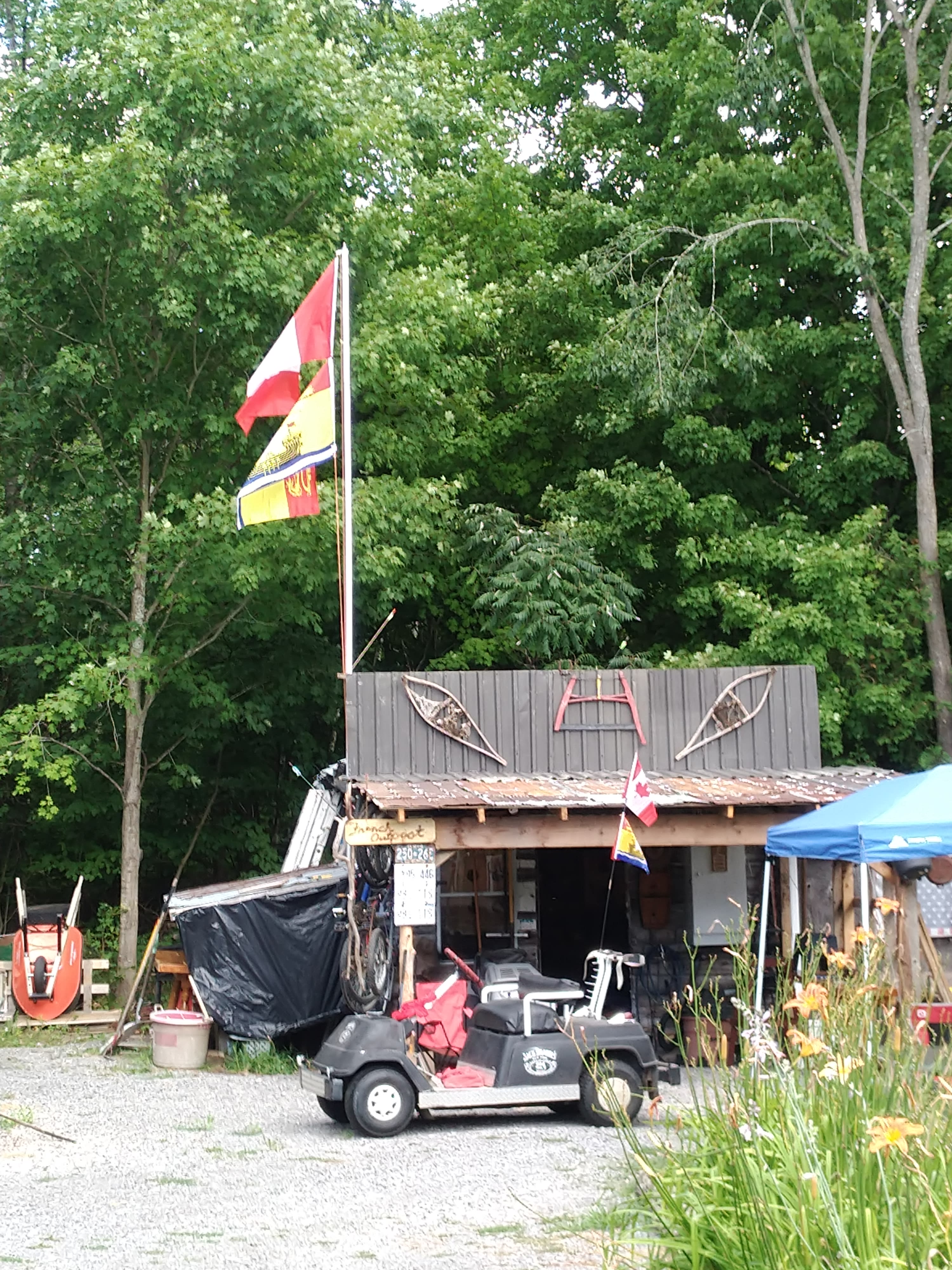 This area is Pépé's French Outpost with the Golf Cart to match. Canadian & New Brunswick Flags