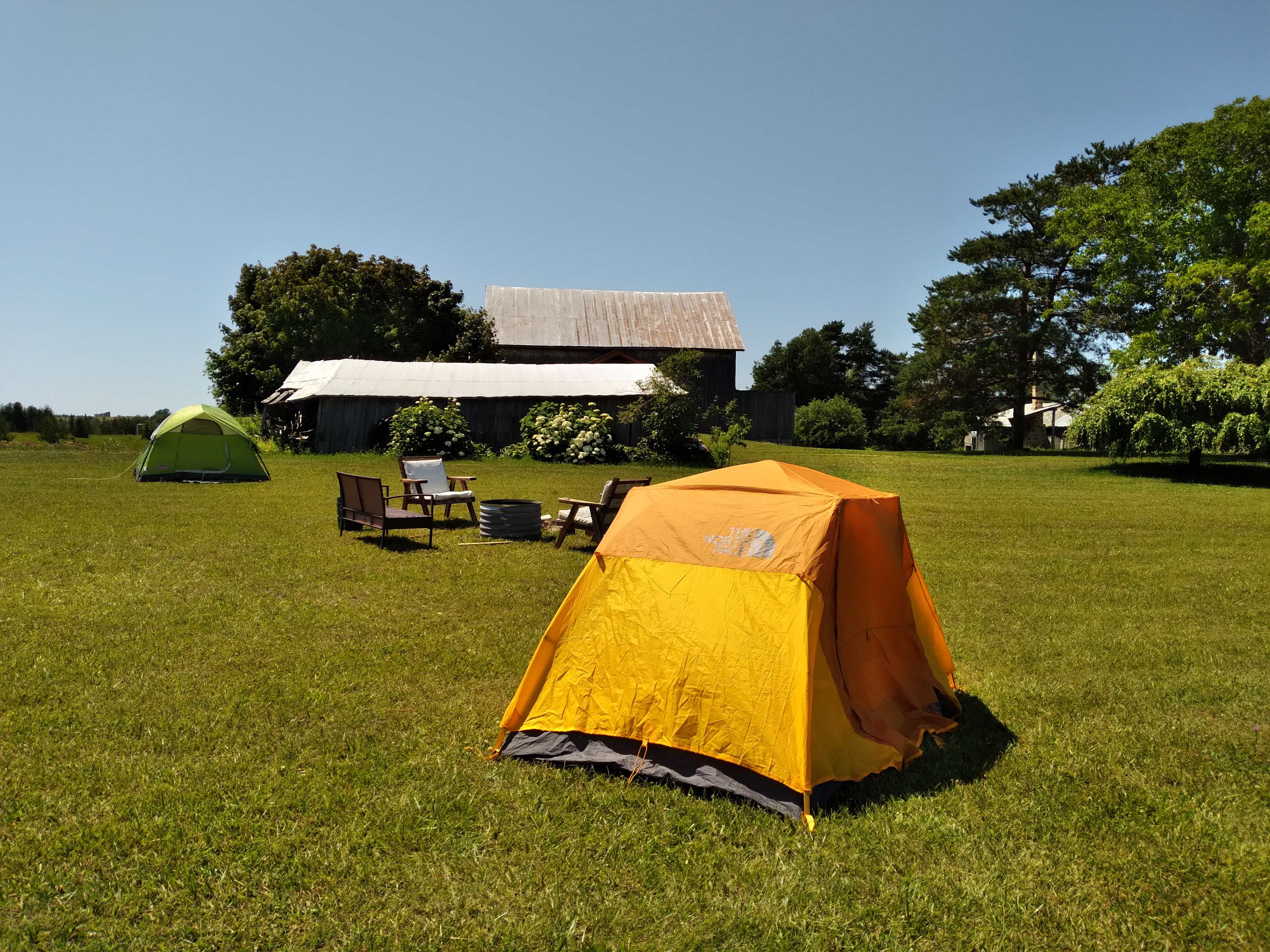 Lots of room for multiple tents and includes a fire ring and fire wood. Easy access to the Events Barn.