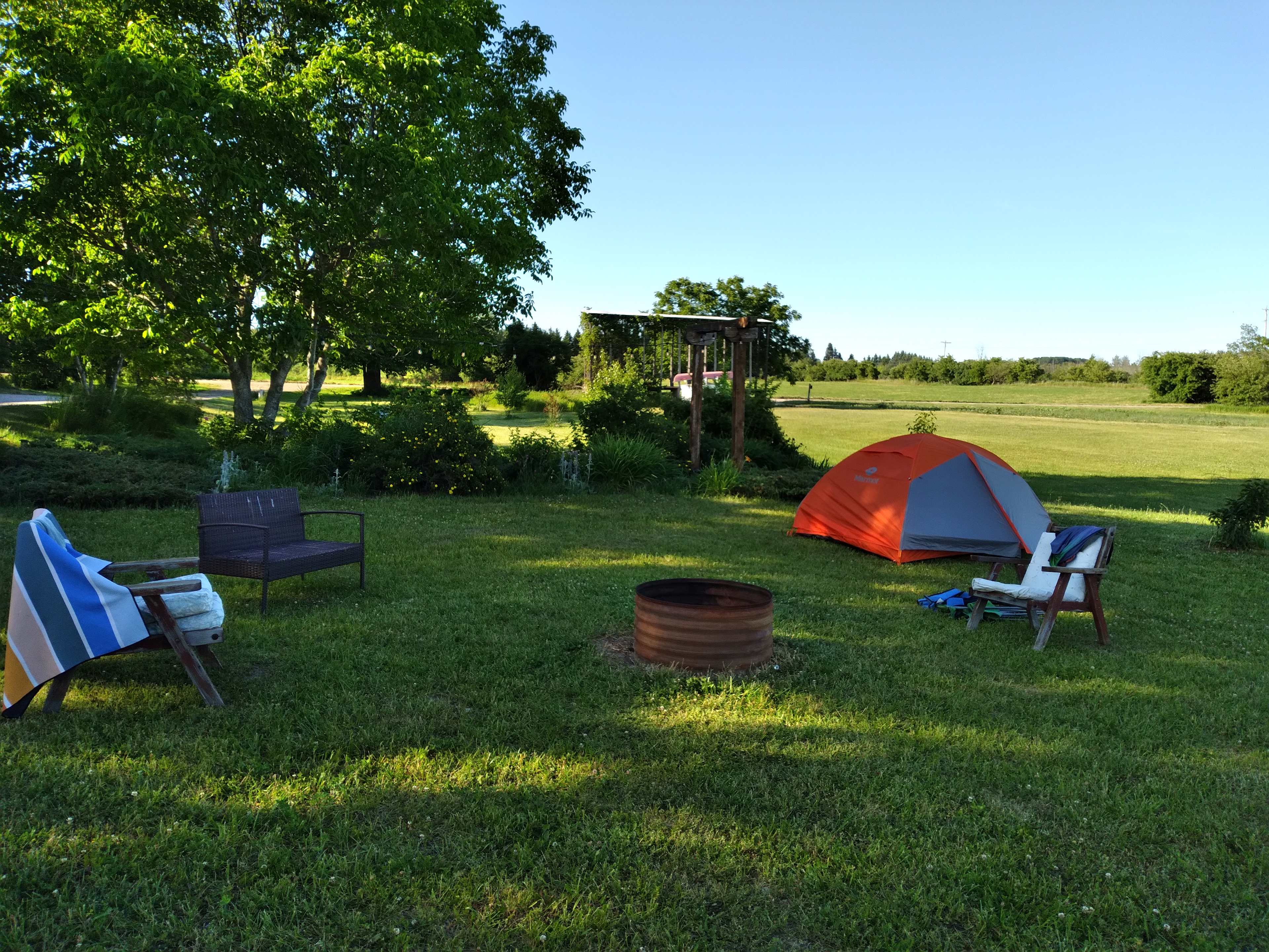 Site 2 has a fire ring and includes firewood. Easy access to the Events Barn bathrooms and shower. 