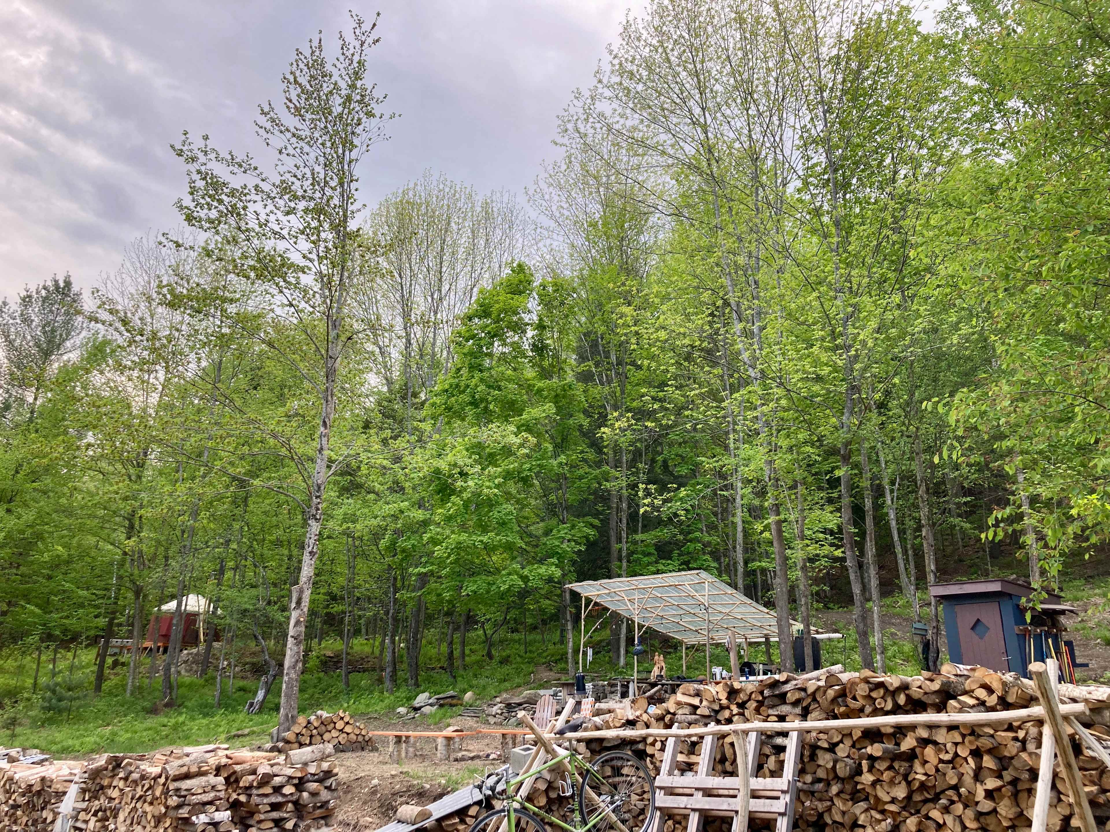 Outdoor kitchen and firepit view 