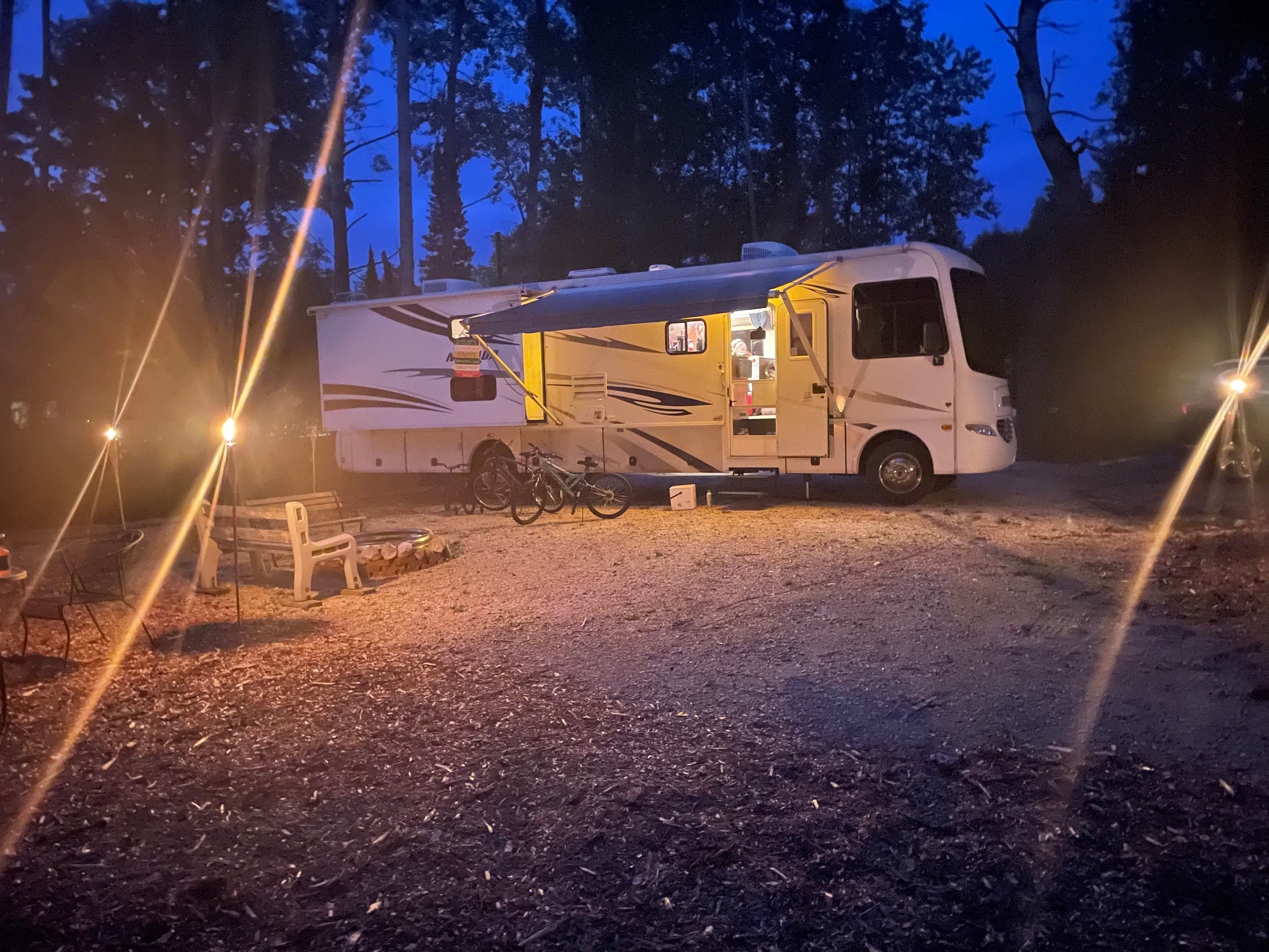We (39') are parallel to the road facing the electrical connections, grill, and campfire. 