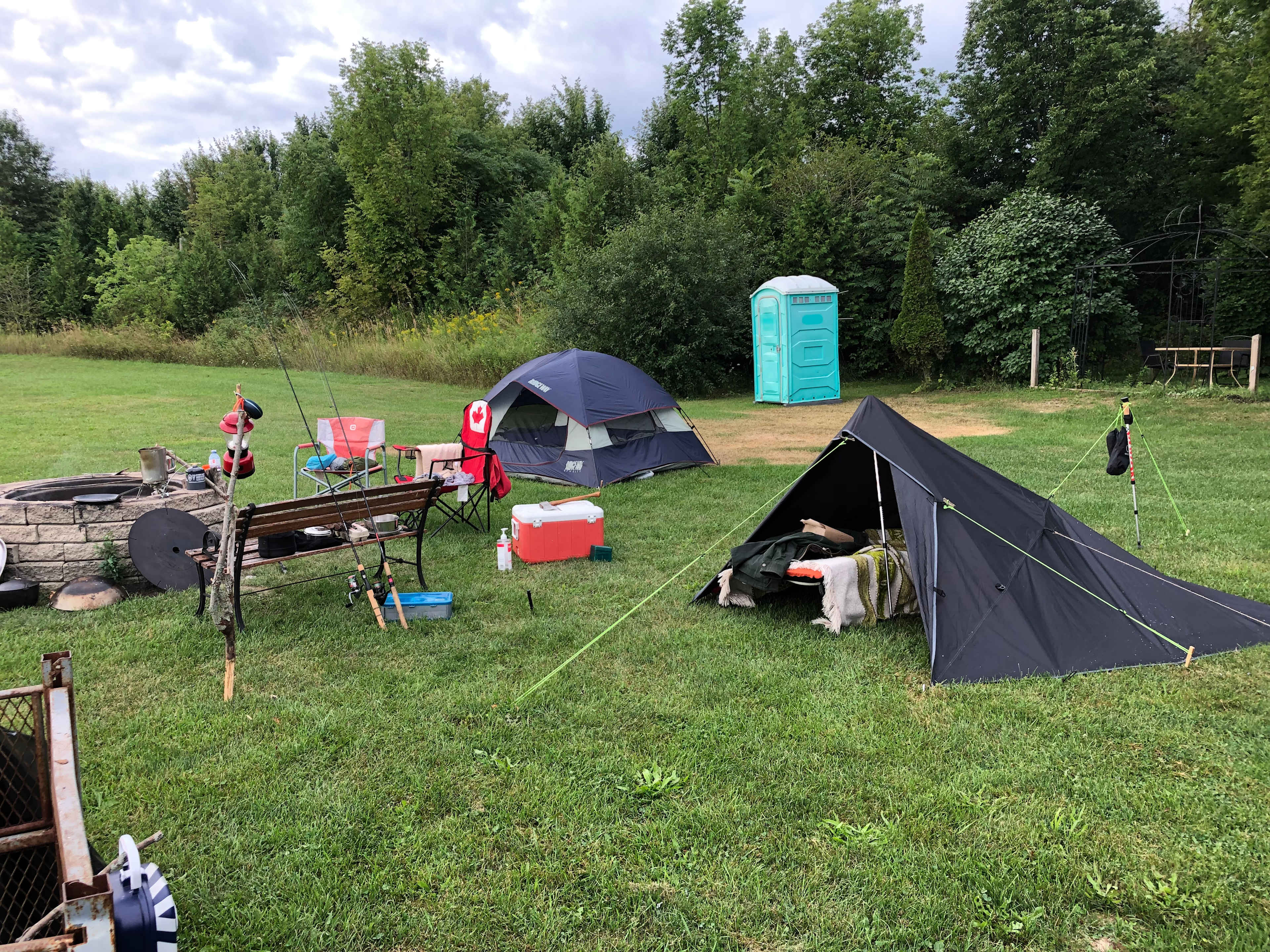 Two shelters, one camper