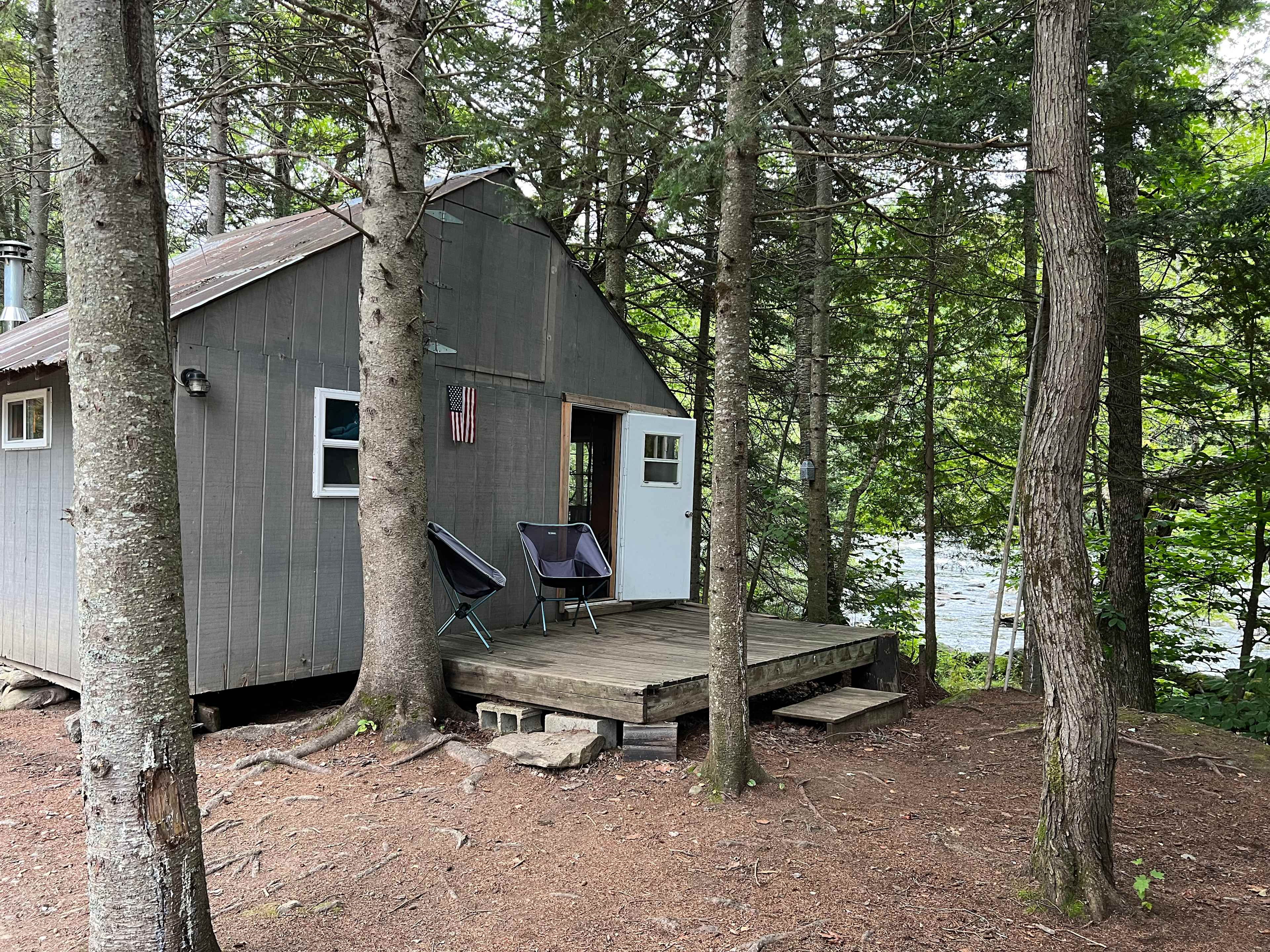 Grey Cabin next to Androscoggin River.