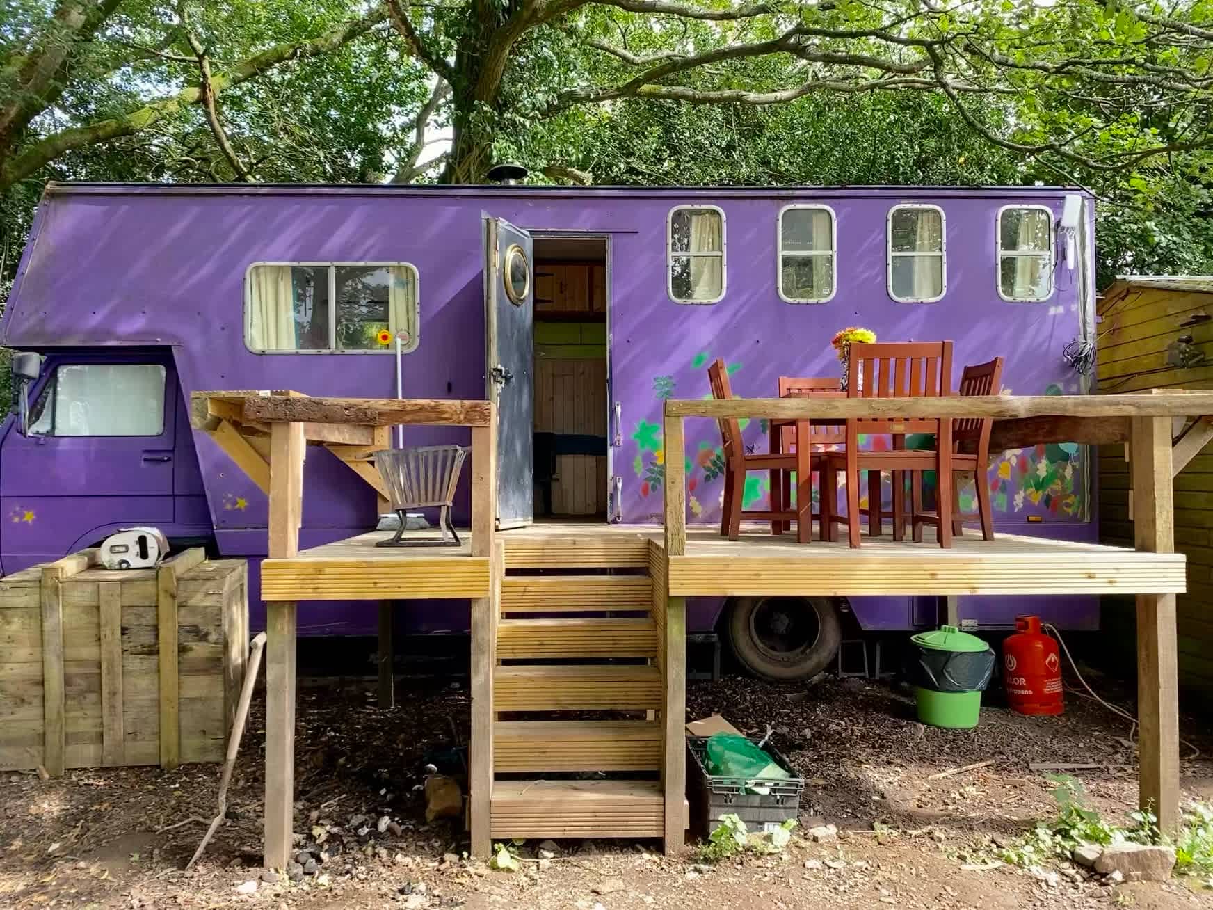 Horsebox terrace nestled in our oak copse with far reaching views of Wye Valley.