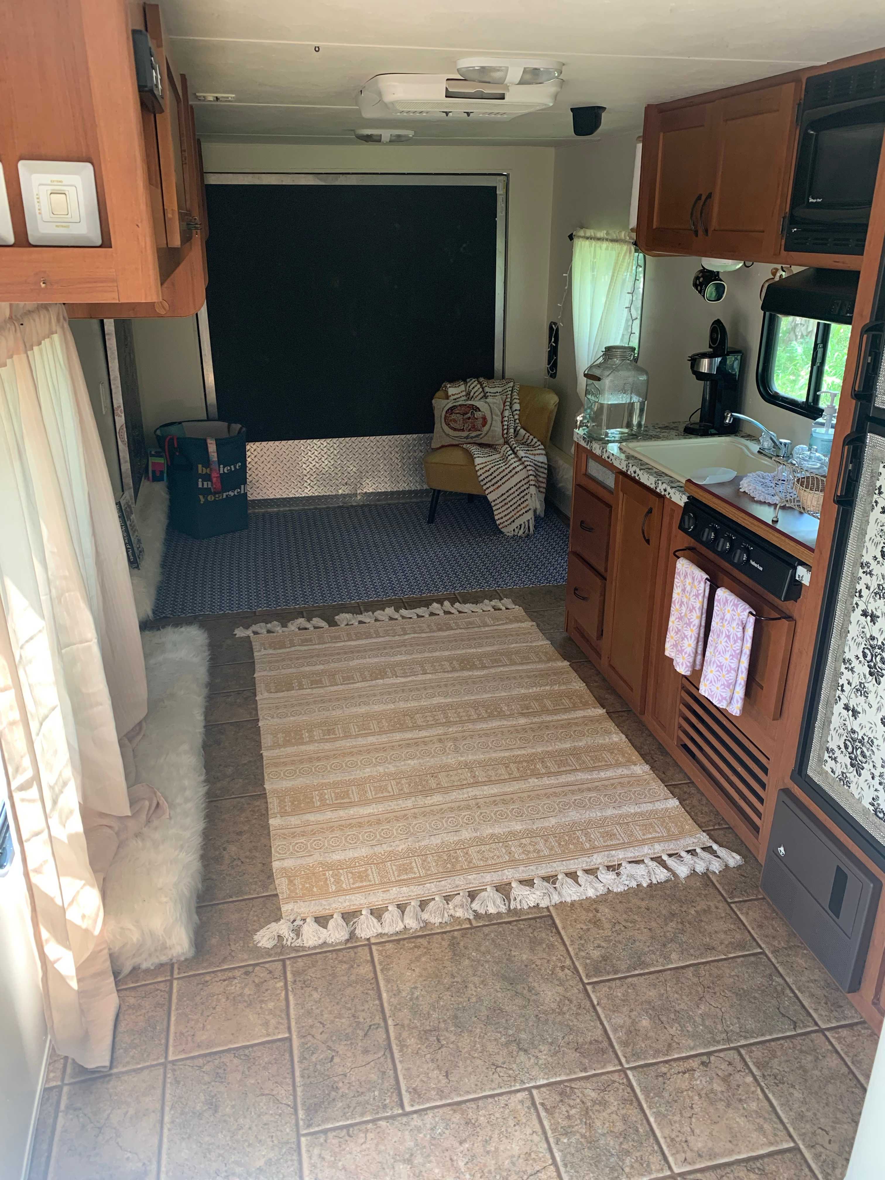 Grey Wolf Camper looking to left at doorway 