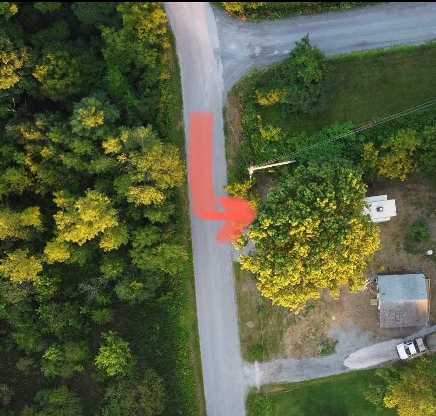 Overhead view of both driveways, house and RV space. 