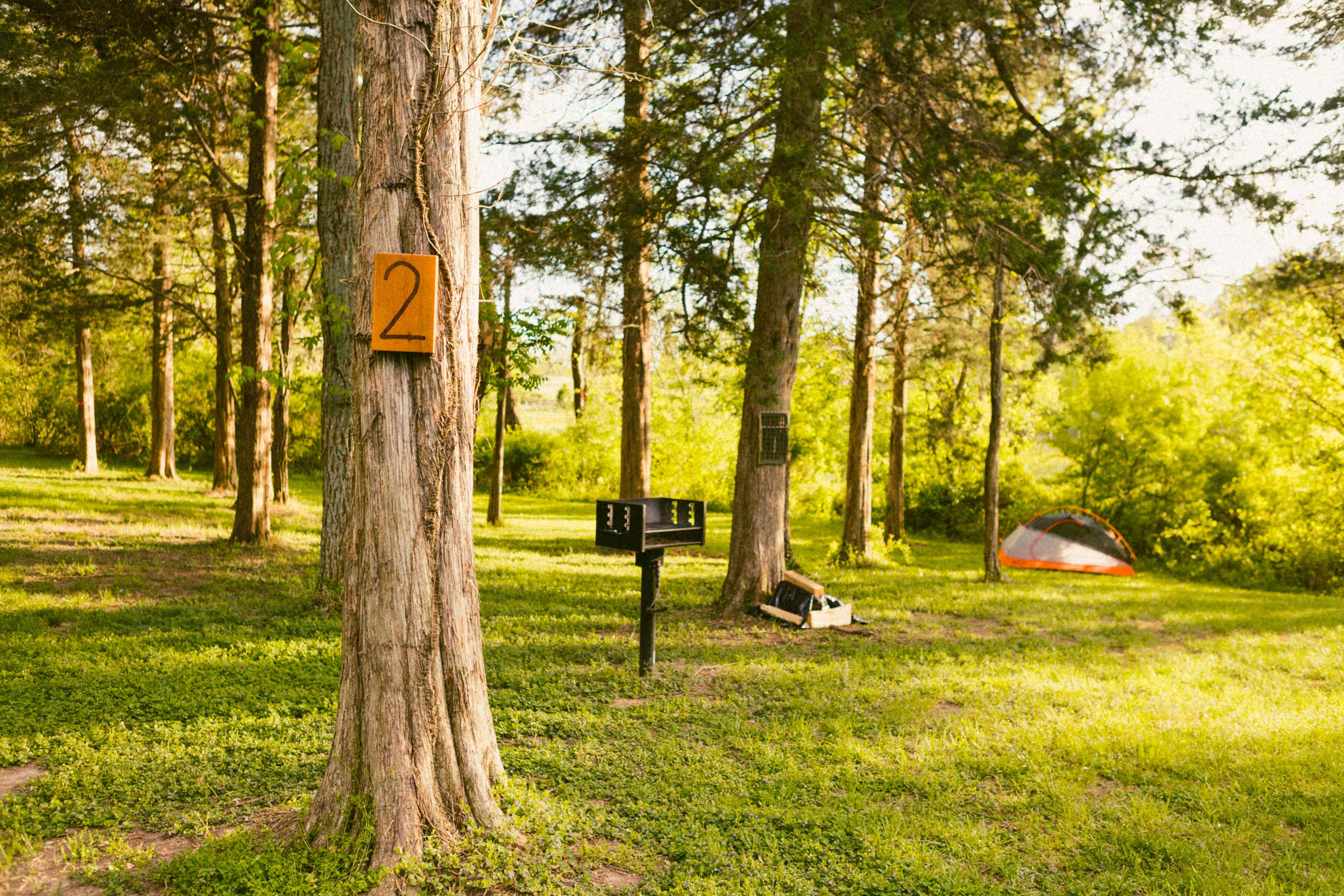 good signs at the campsite and a charcoal grill 