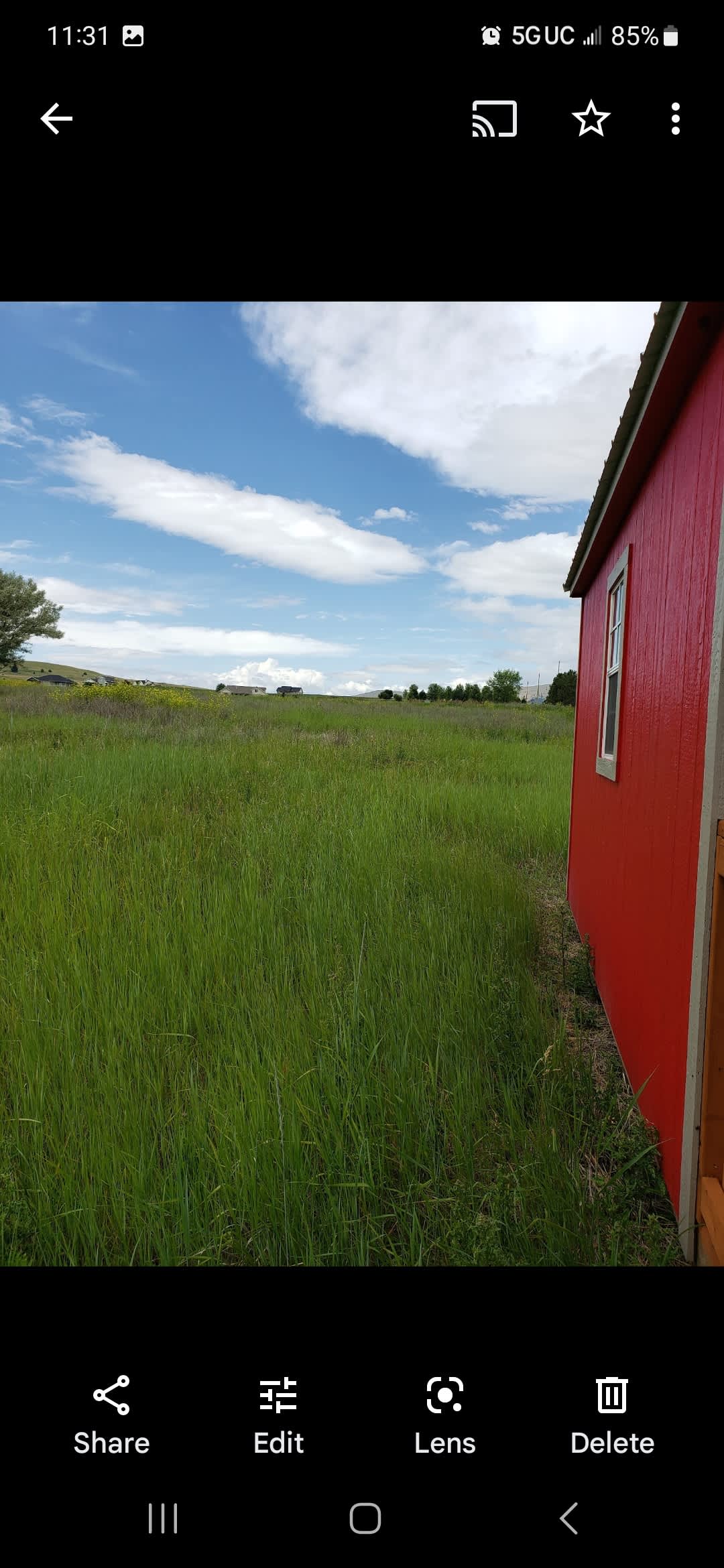 Pull in at red cabin/driveway