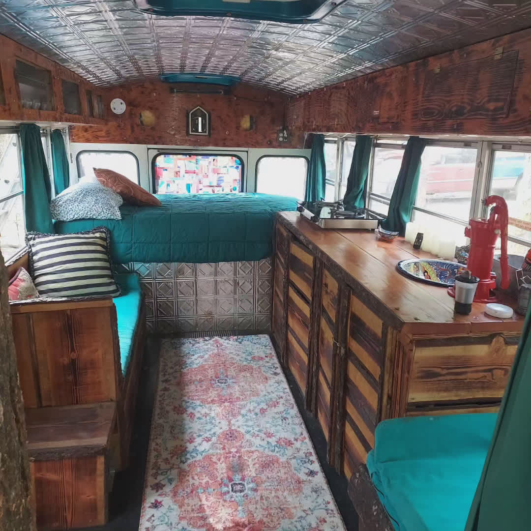The Magical school bus is an adventure you won't forget! Set on 20 acers of wooded forest. We have created a whimsical wonderland like no other. We think you'll fall in love with what we have created like so many other guests have. Our bus comes equipped with it's own kitchenette with cooking oils, spices, cook and serving wear, a very comfortable queen size bed plus much more, set in your own part of the forest.