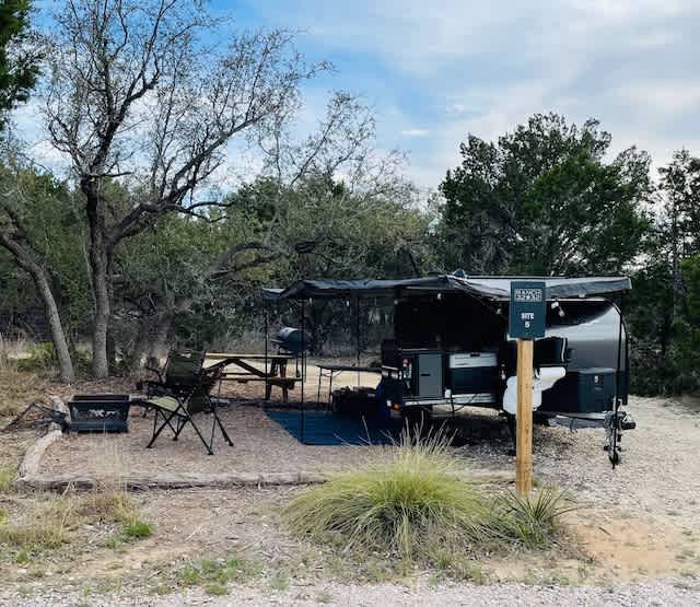 Great site for both RVs and Tents.  50/30 amp hookup with water and 110v outlets. Mulched area with picnic table, fire ring and grill