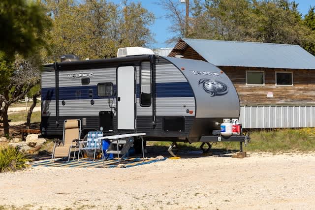 RV site with full 30 amp hookup, water and septic.  Next to fully stocked community kitchen.
