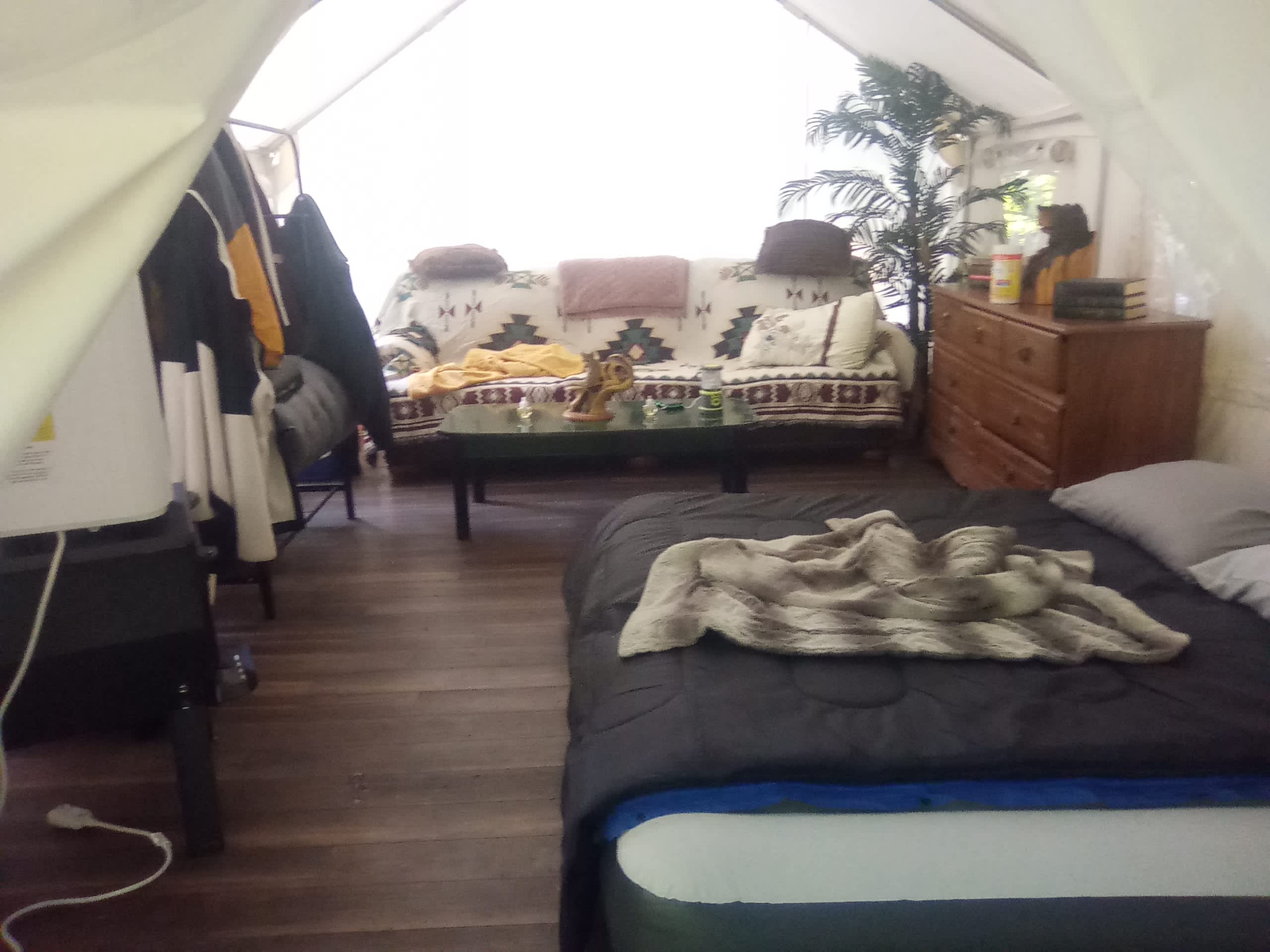 Everything you need. Comfortable couch, double sleeping bags over memory foam and Sleeplux air mattress. Sleeping bags and mattress can be separated.