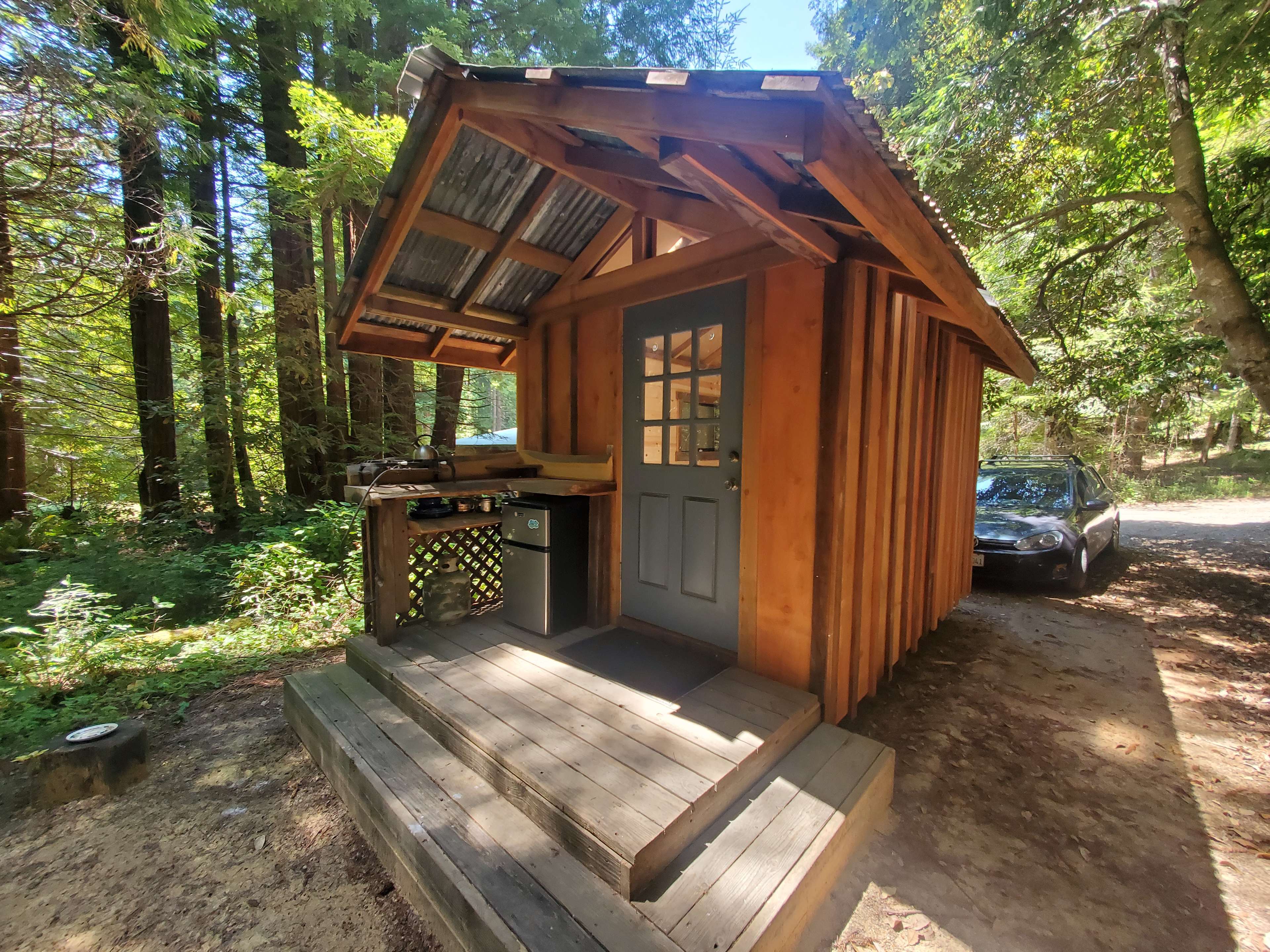 Front deck and kitchenette of mushroom cabin
