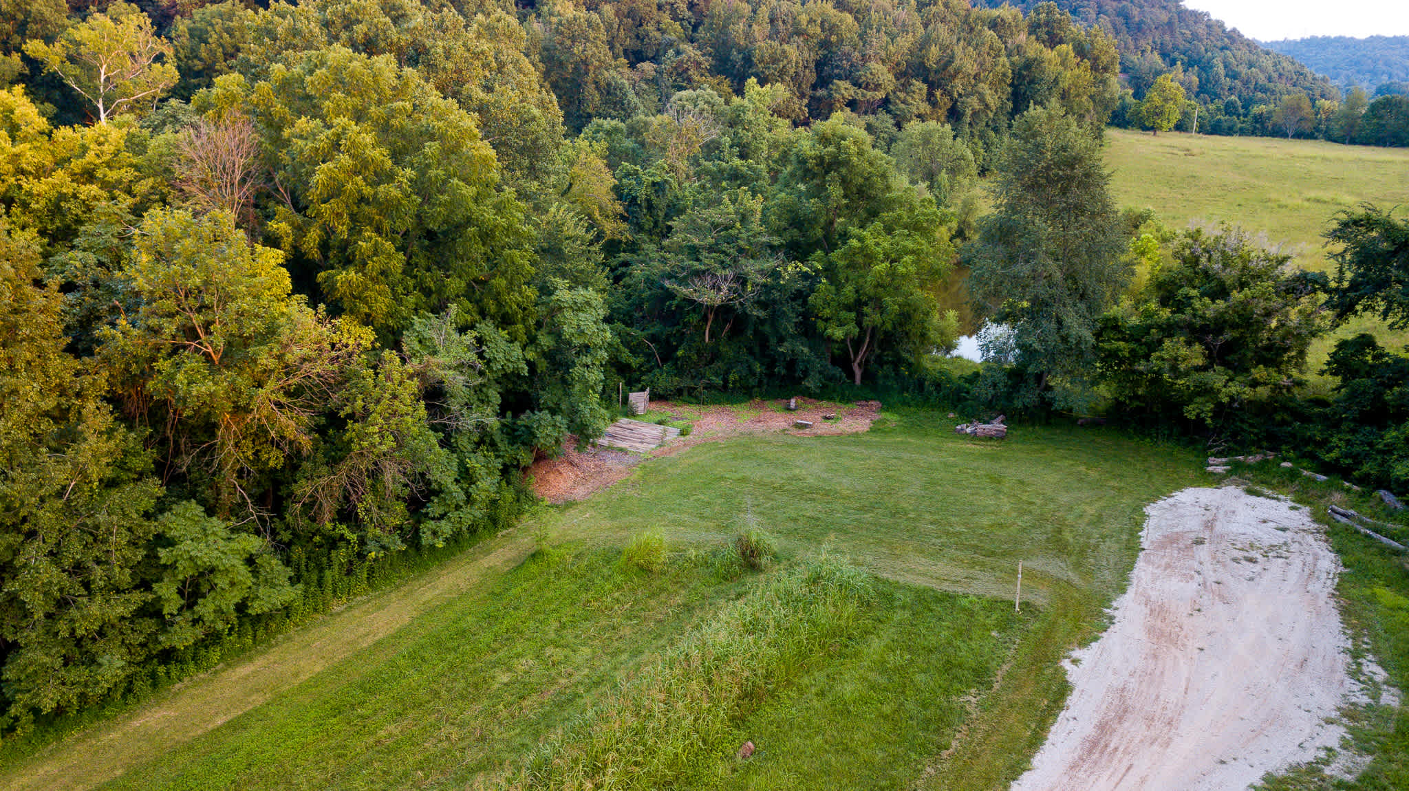 Aerial view of campsite number three at the very back of 5 acre field. The property borders Jefferson County Memorial Forest city park directly behind