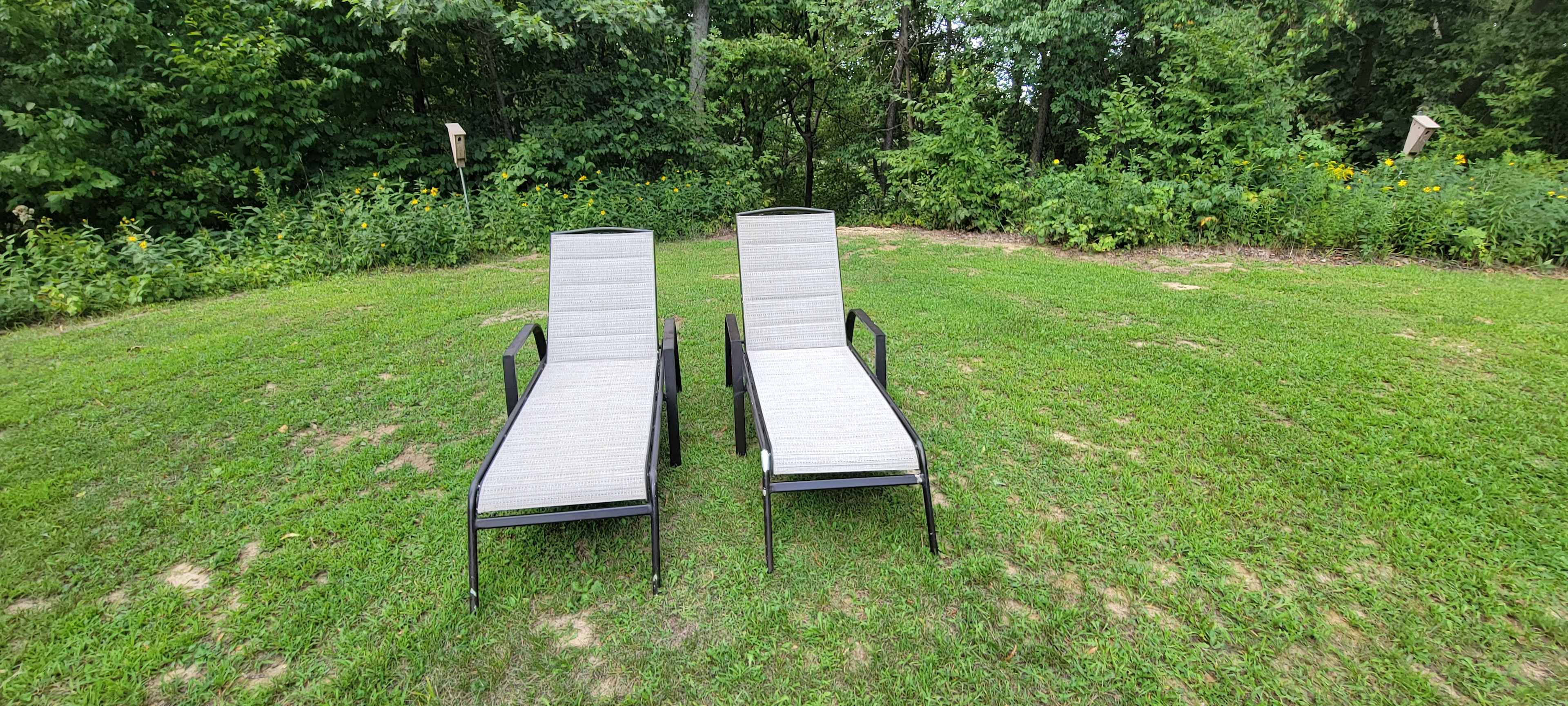 Relax in the reclining layout chairs enjoying a cool beverage as you take in the sun. Large open space, set up hill from the main house with privacy to relax. Lots of free space to relax and yet room to wander. Take time to explore the trails and bond with nature. All area on property is clothing optional to your comfort level.  Great way to spend your lunch hour, a break from life for a few hours or spend the day reading a good book. Bring a friend for a great time together in nature. Lots of cool spots for photos and hearing all nature as to tell you. 